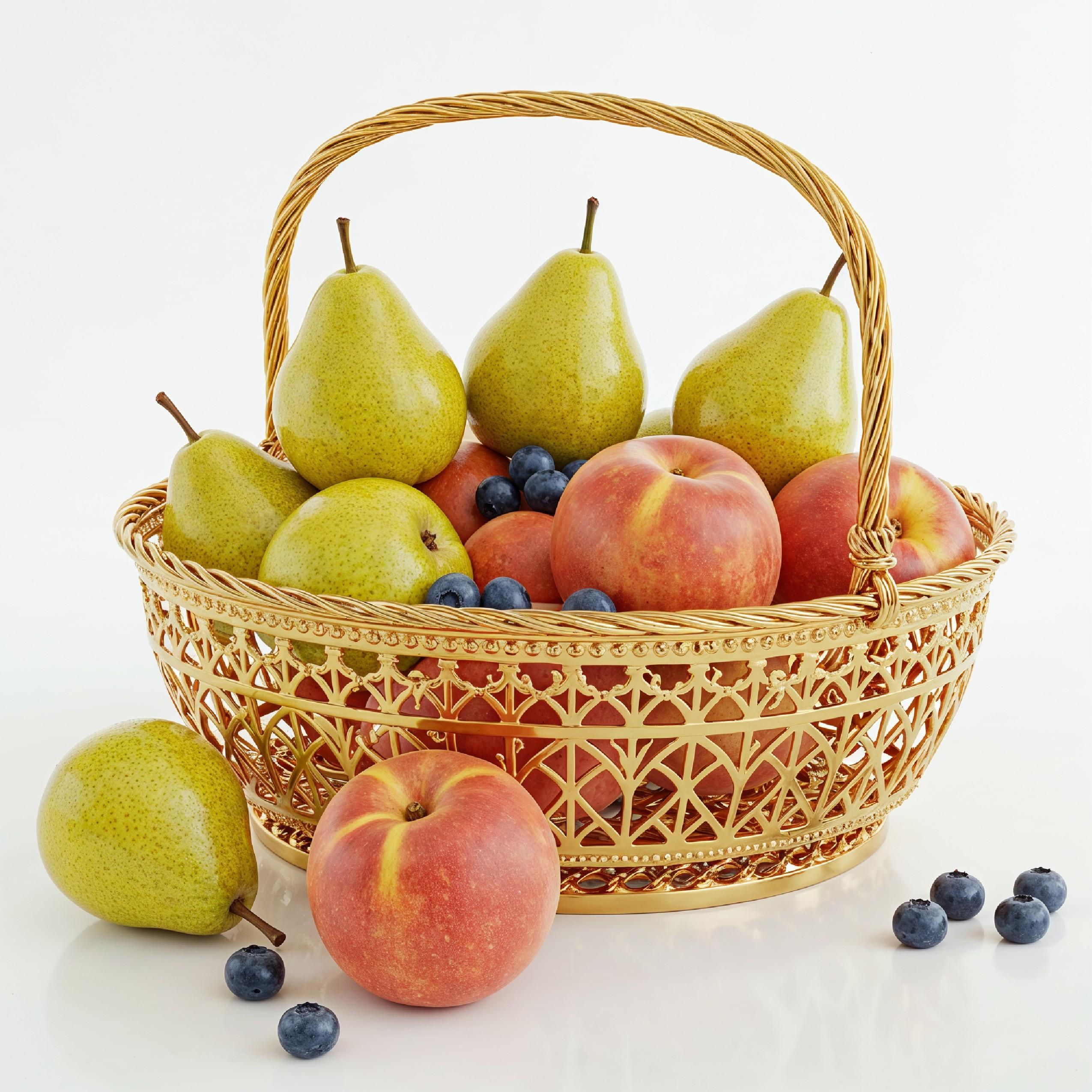 Luxury Golden Fruit Basket with Pears and Peaches Isolated on White Background