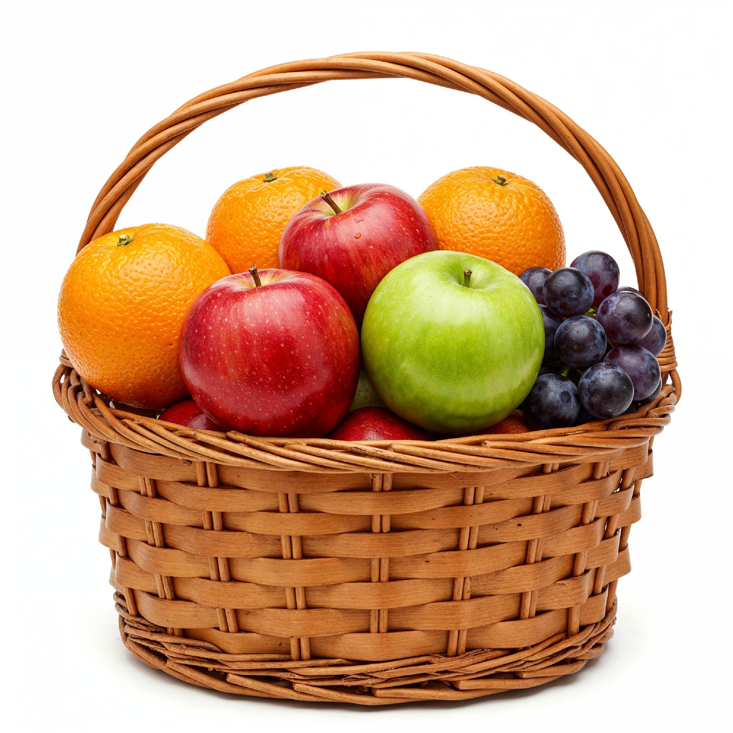 Rustic Wicker Fruit Basket with Fresh Apples, Oranges and Grapes on White Background