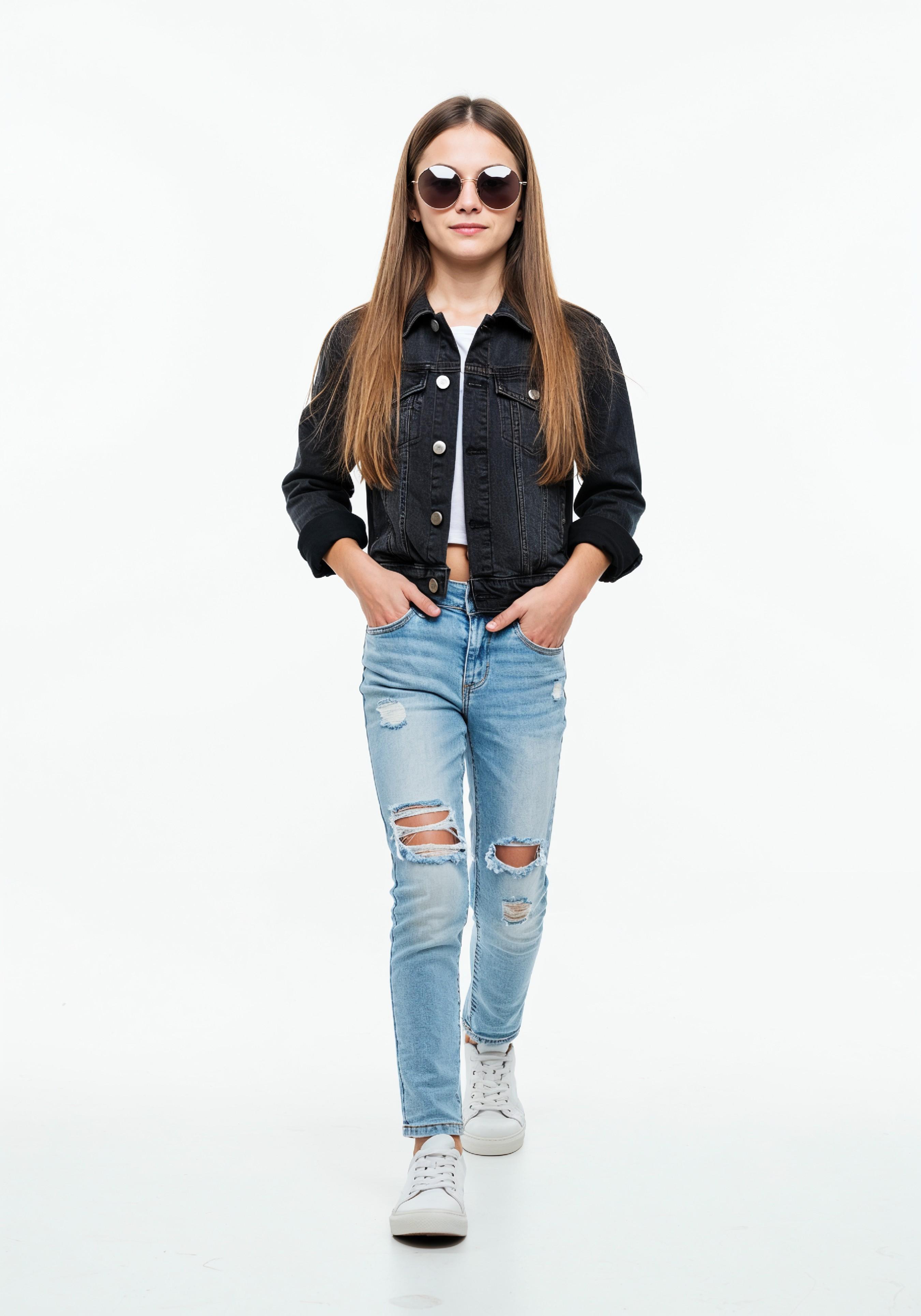 Adorable Young Girl in Denim Jacket and Sunglasses Posing on White Background Portrait