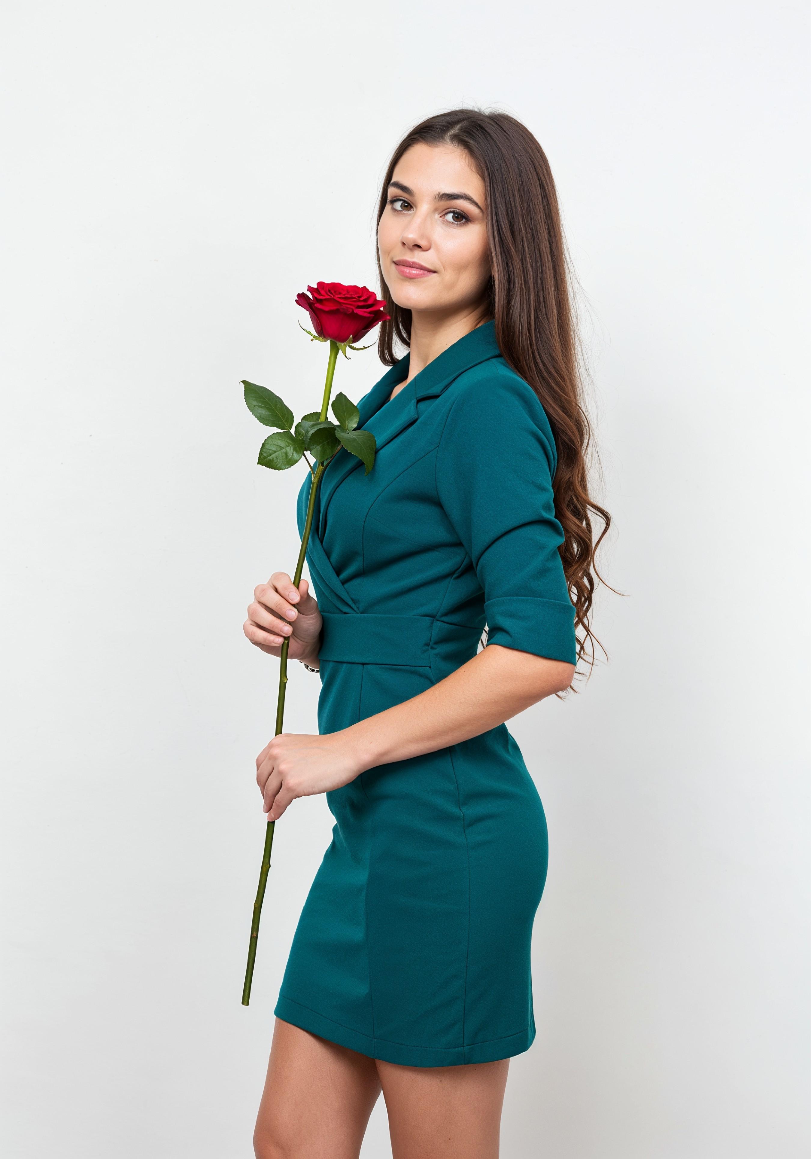 Beautiful Young Woman Holding Red Rose in Elegant Dress Romantic Portrait