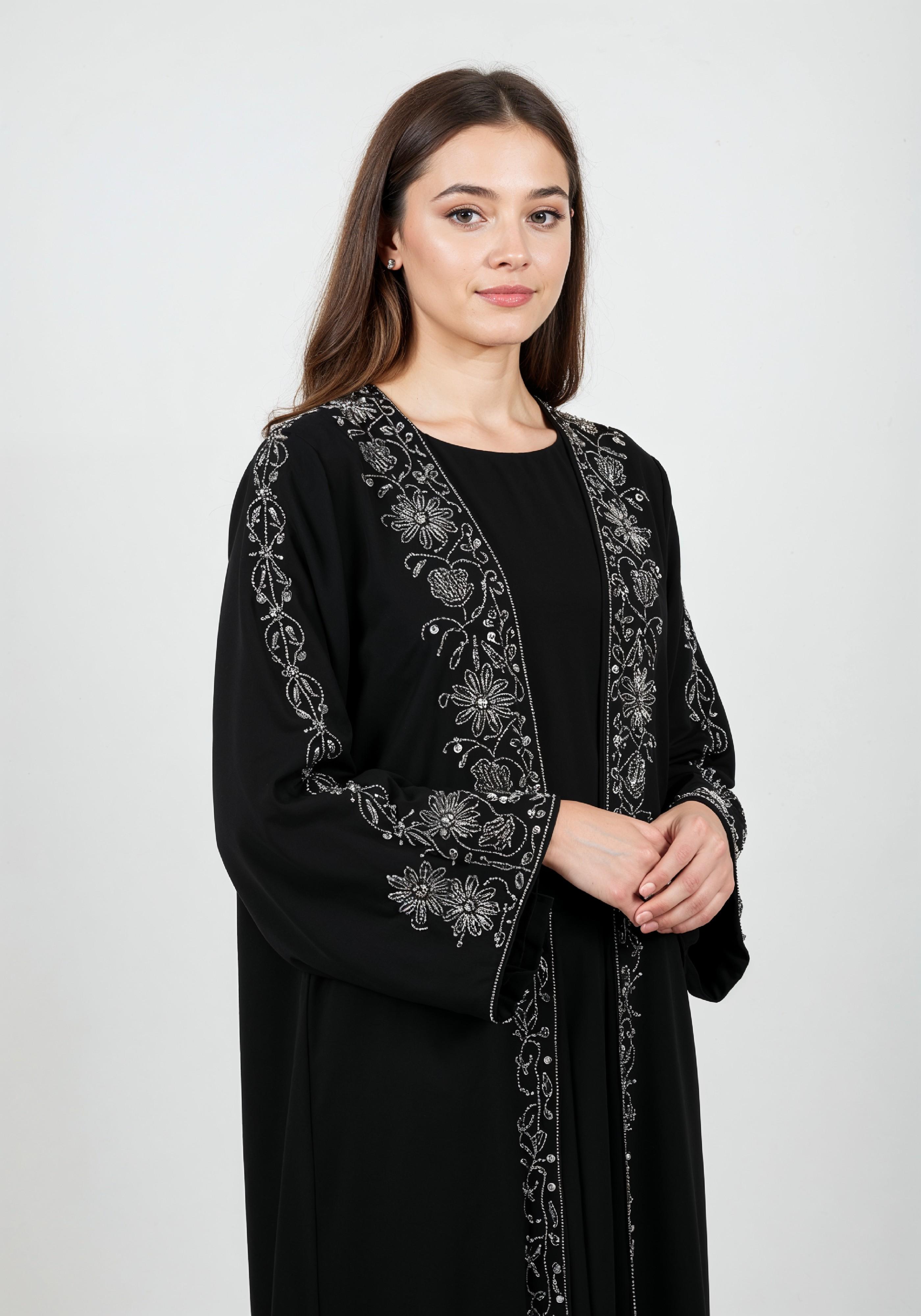 Elegant Muslim Woman in Black Embroidered Abaya and Hijab Full Length Fashion Portrait