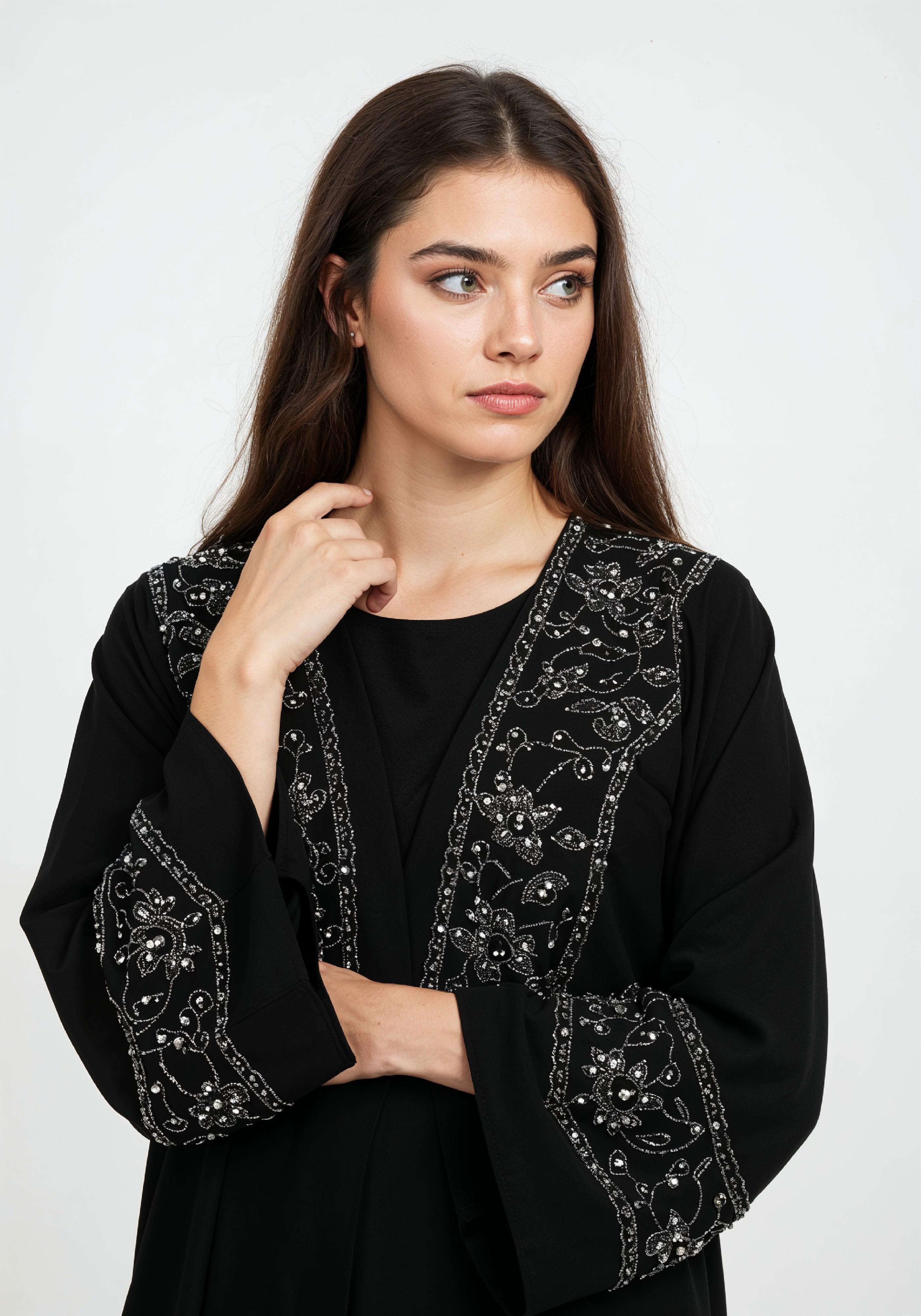 Elegant Muslim Woman in Black Embroidered Abaya and Hijab Full Length Fashion Portrait