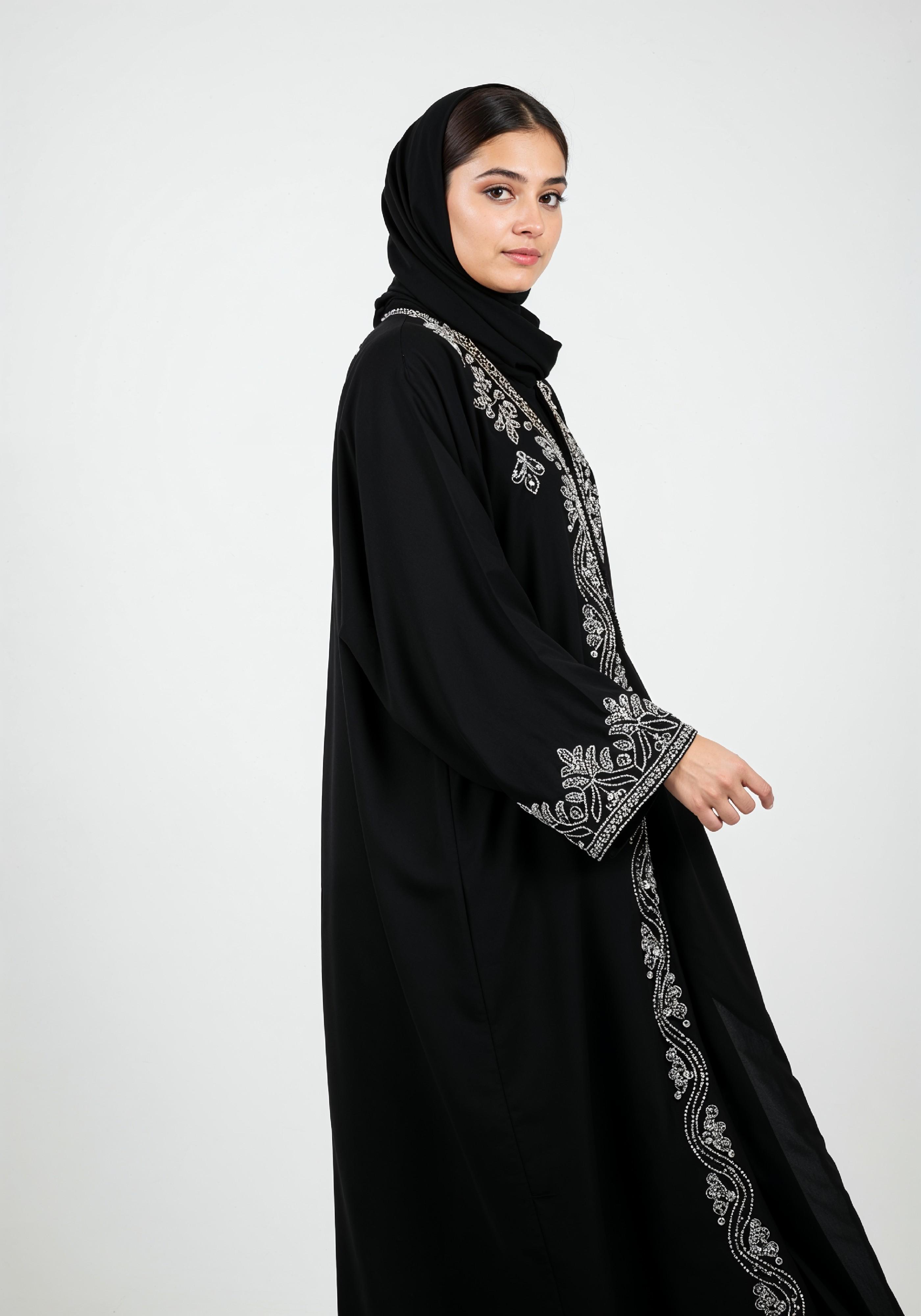Elegant Muslim Woman in Black Embroidered Abaya and Hijab Full Length Fashion Portrait