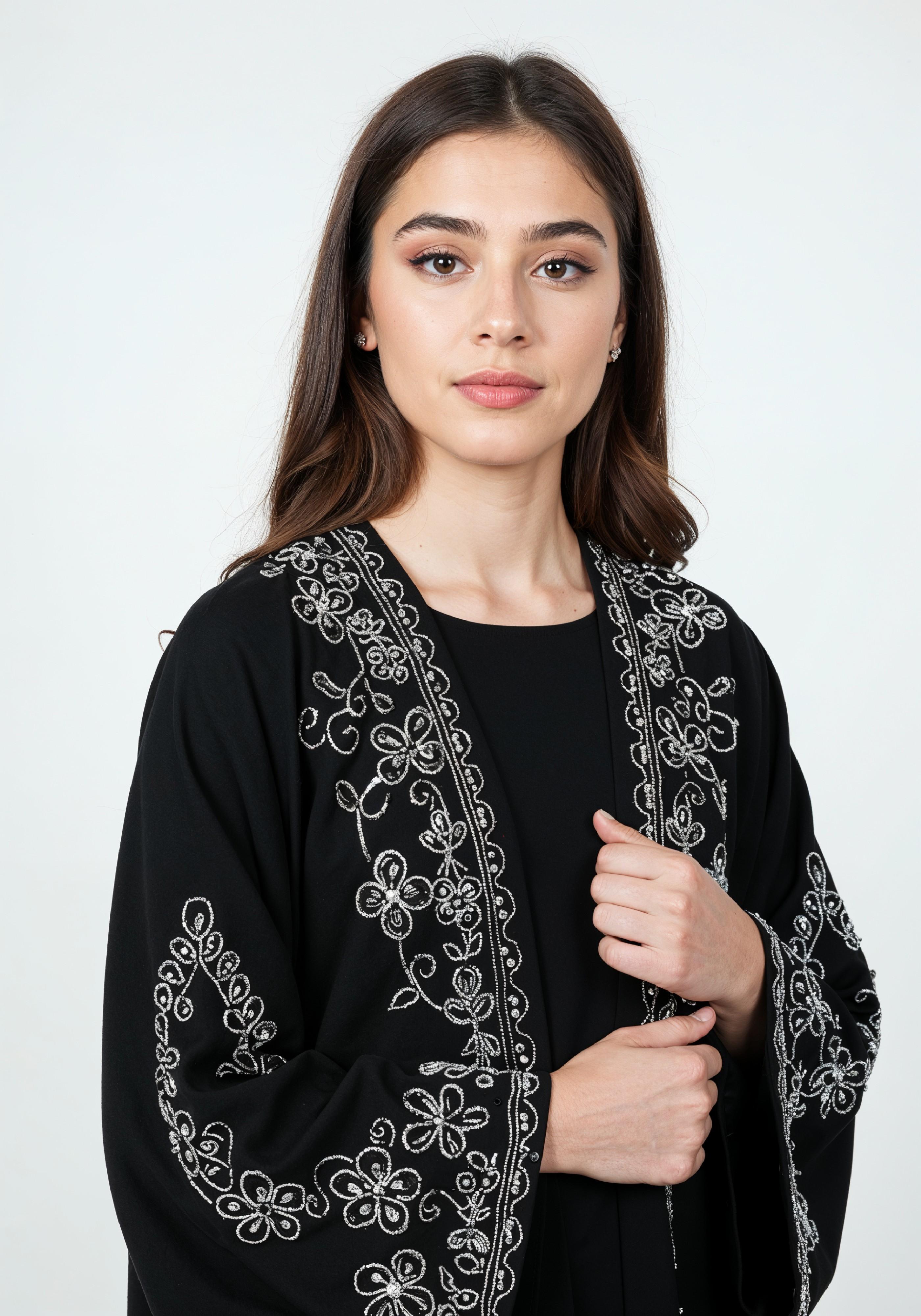 Elegant Muslim Woman in Black Embroidered Abaya and Hijab Full Length Fashion Portrait