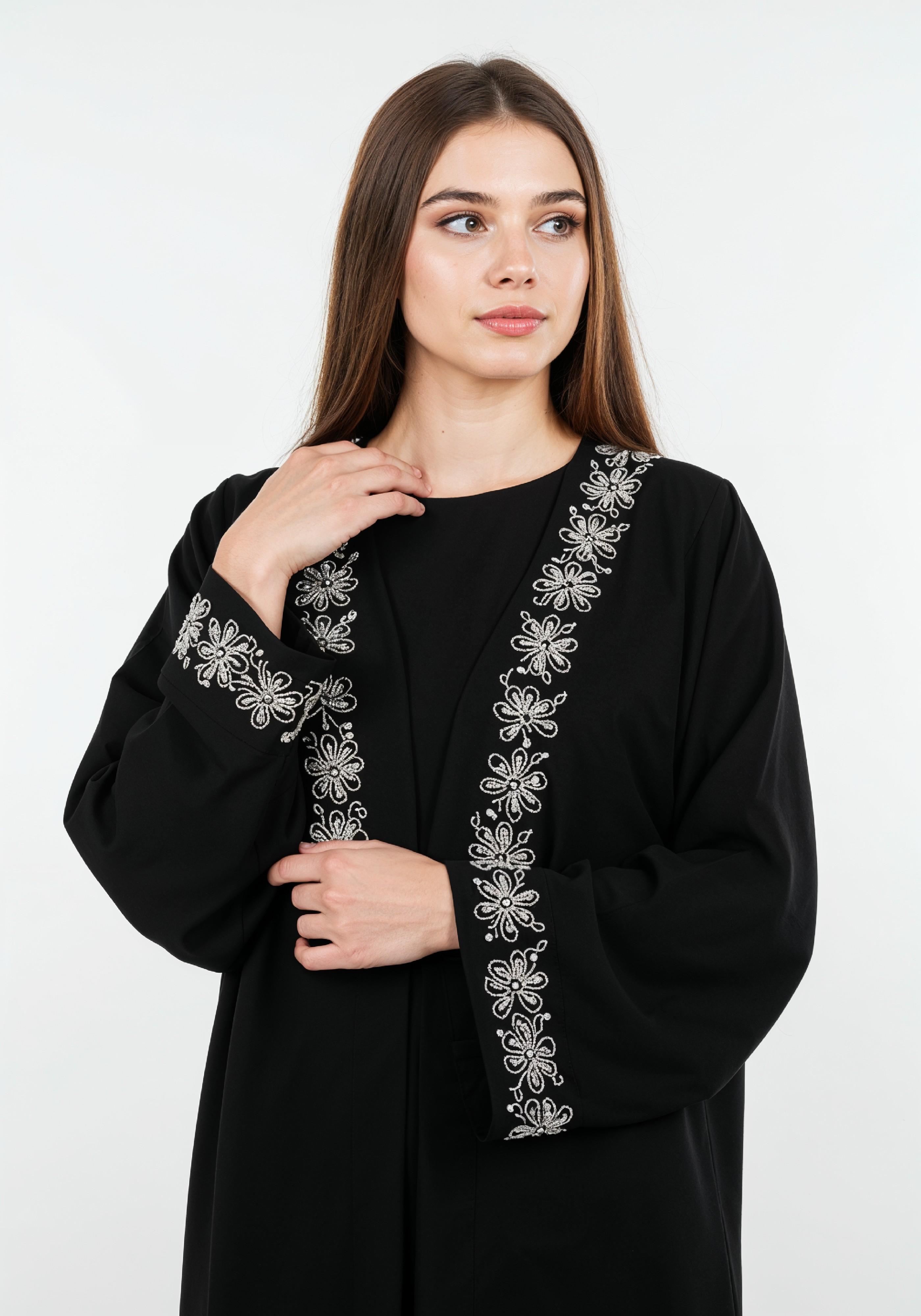 Elegant Muslim Woman in Black Embroidered Abaya and Hijab Full Length Fashion Portrait