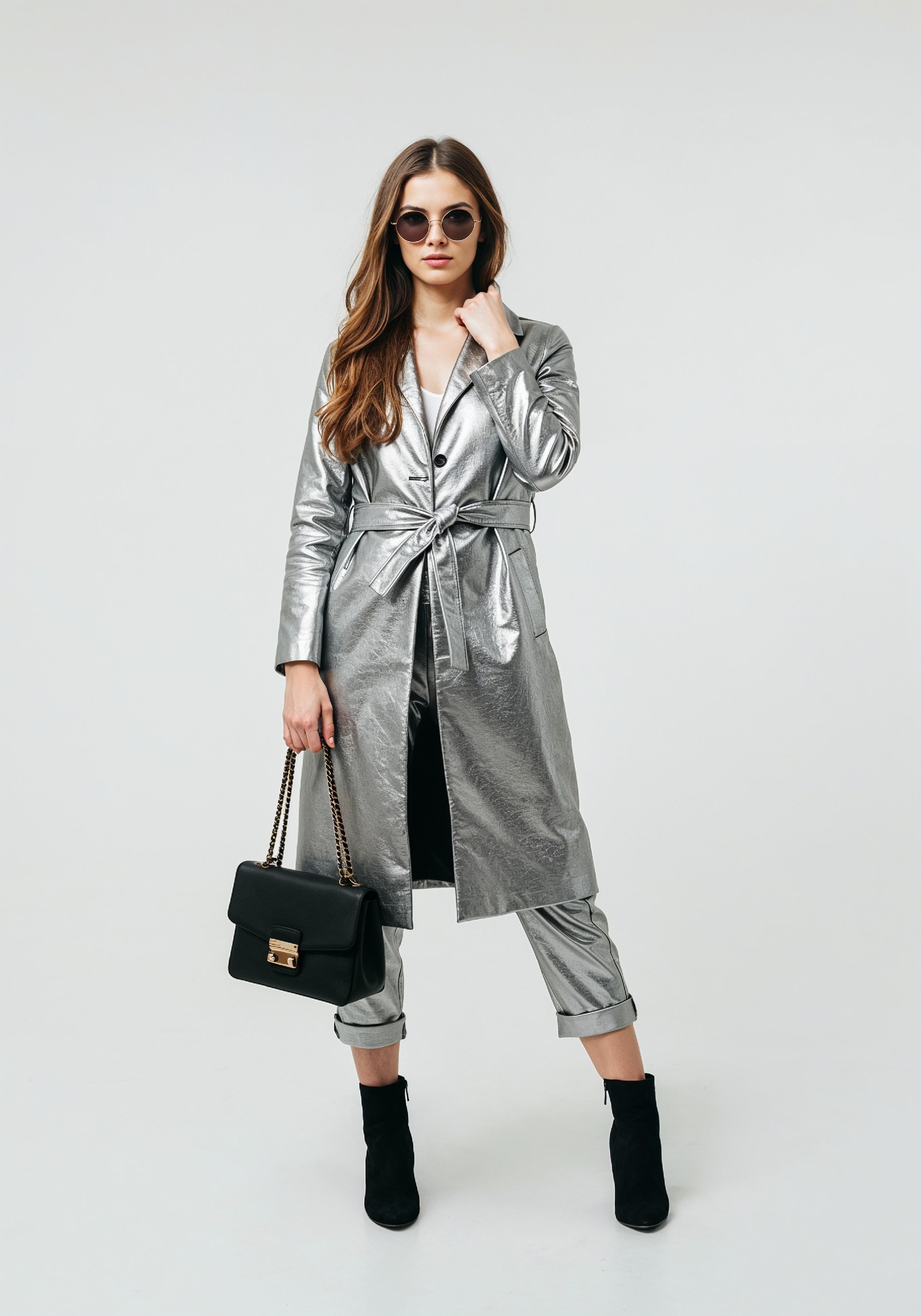 Elegant Young Woman in Coat and Matching Trousers Fashion Portrait