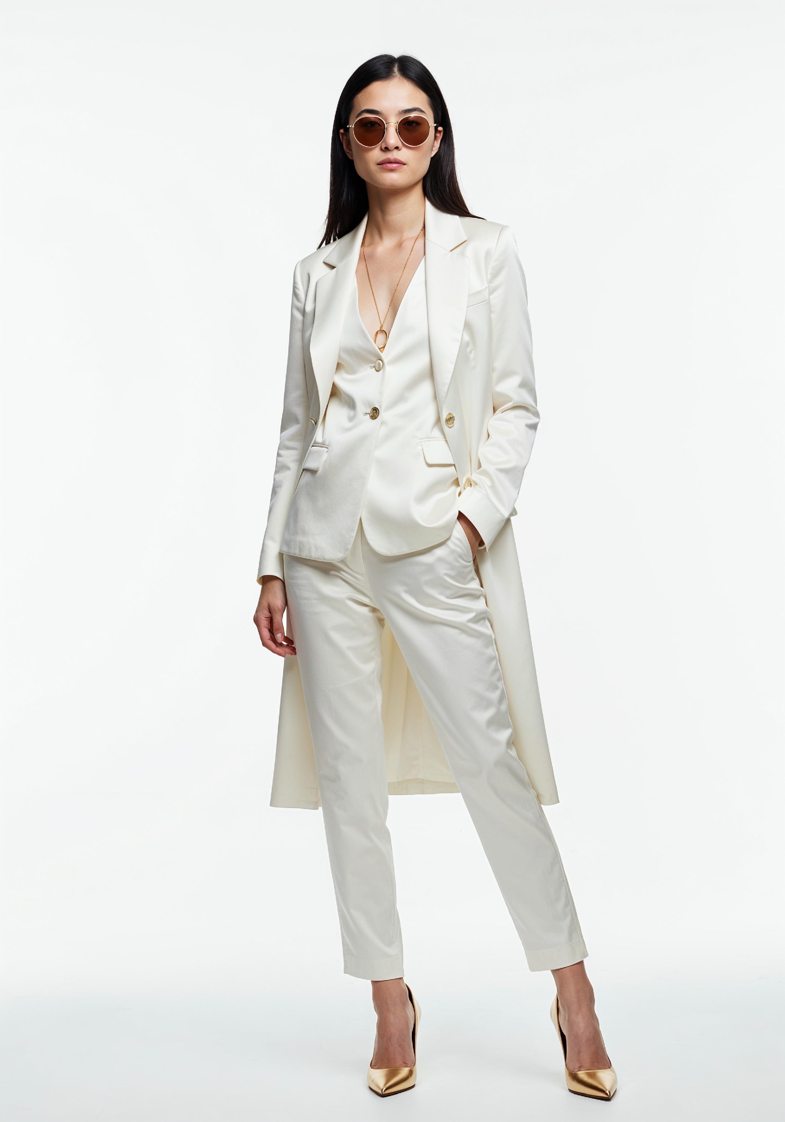 Elegant Young Woman in Coat and Matching Trousers Fashion Portrait