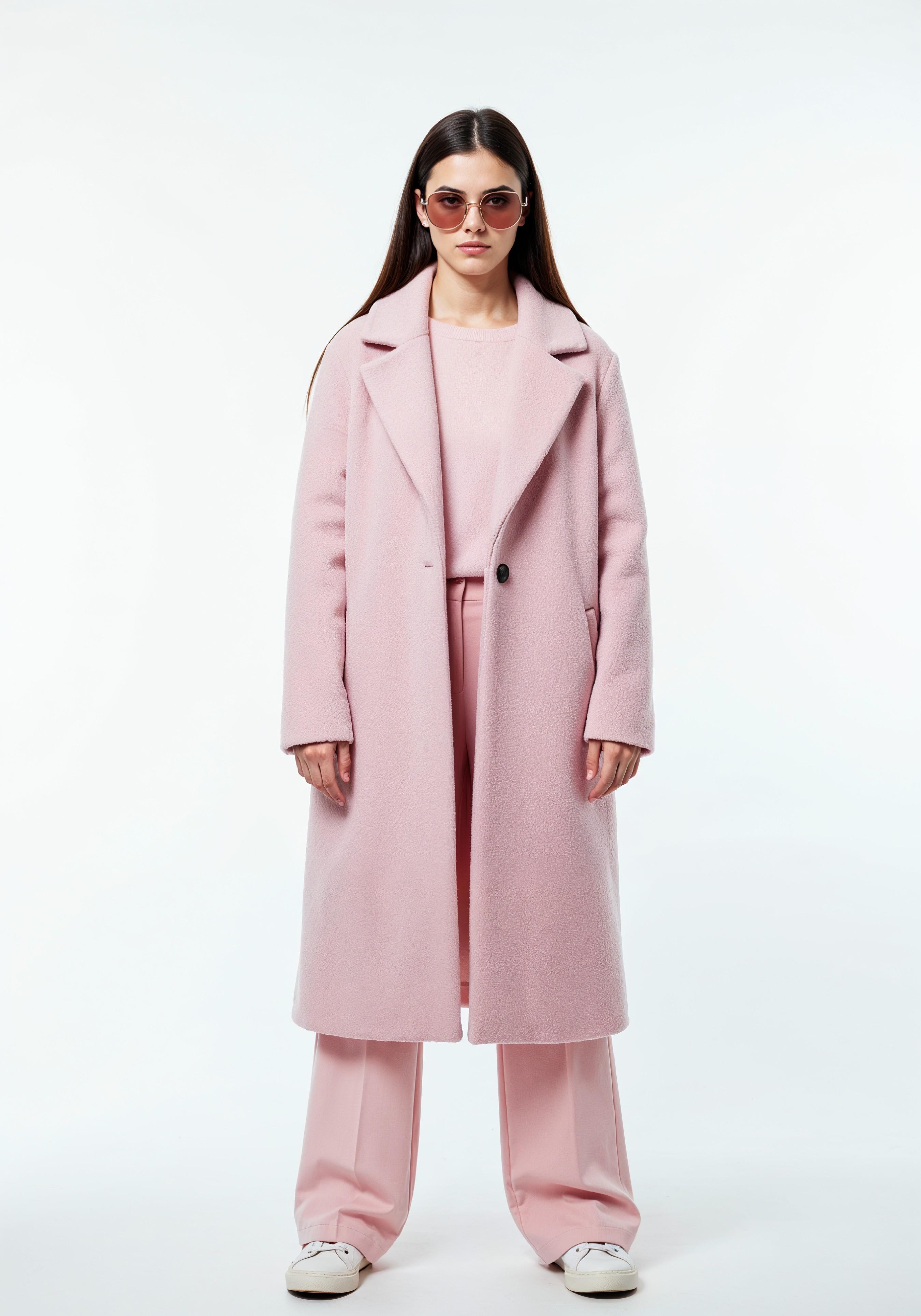 Elegant Young Woman in Coat and Matching Trousers Fashion Portrait