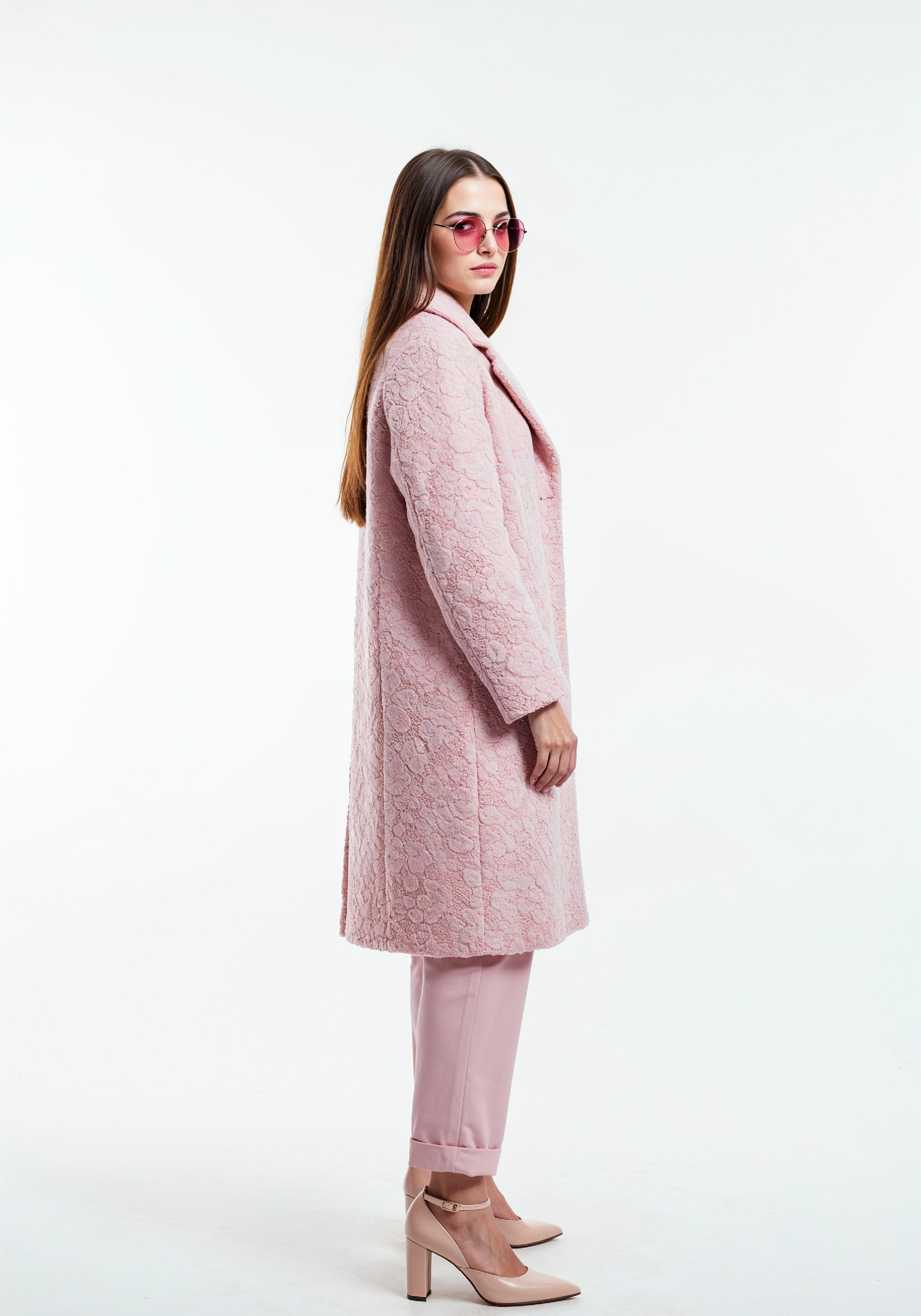 Elegant Young Woman in Coat and Matching Trousers Fashion Portrait