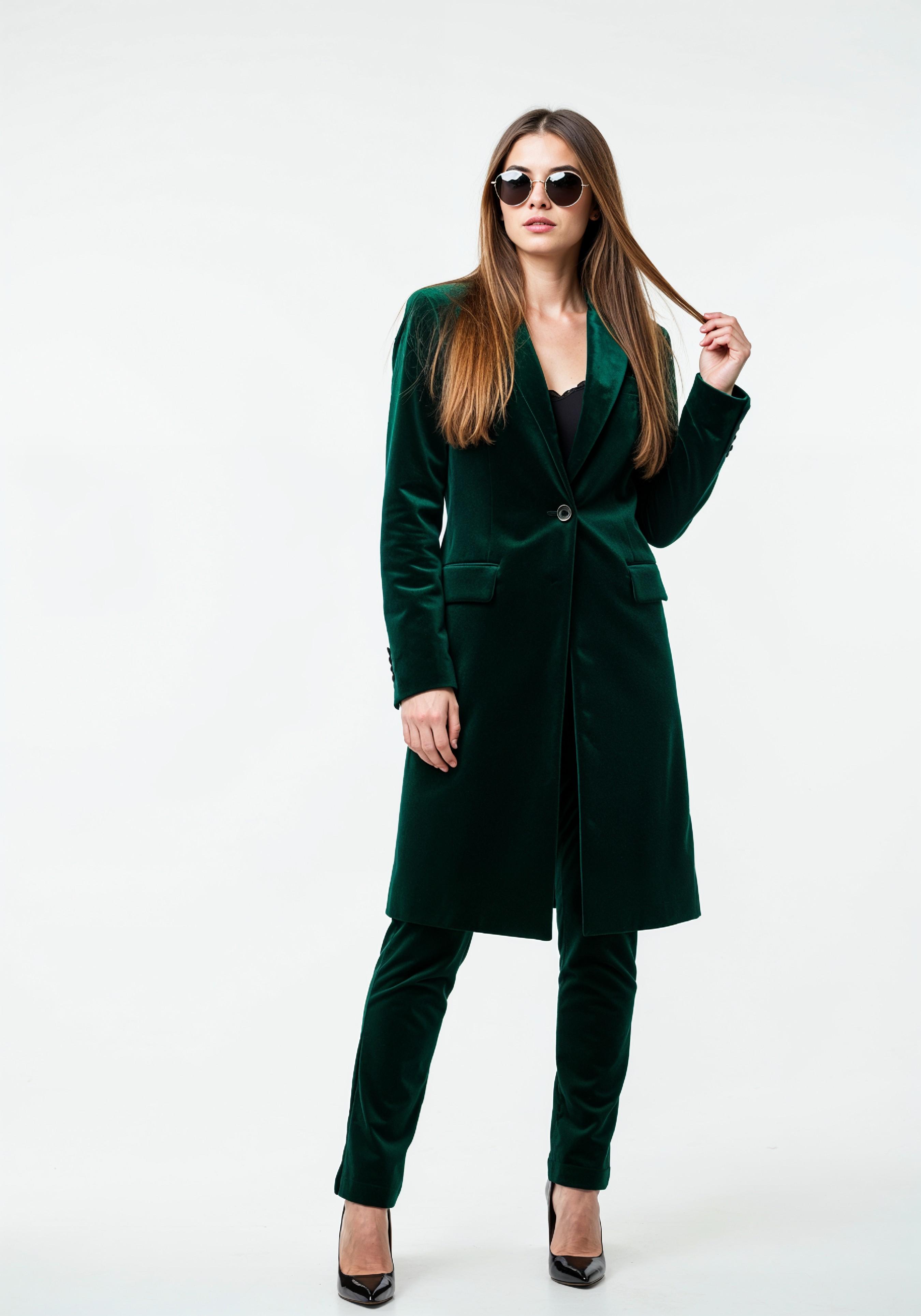 Elegant Young Woman in Coat and Matching Trousers Fashion Portrait