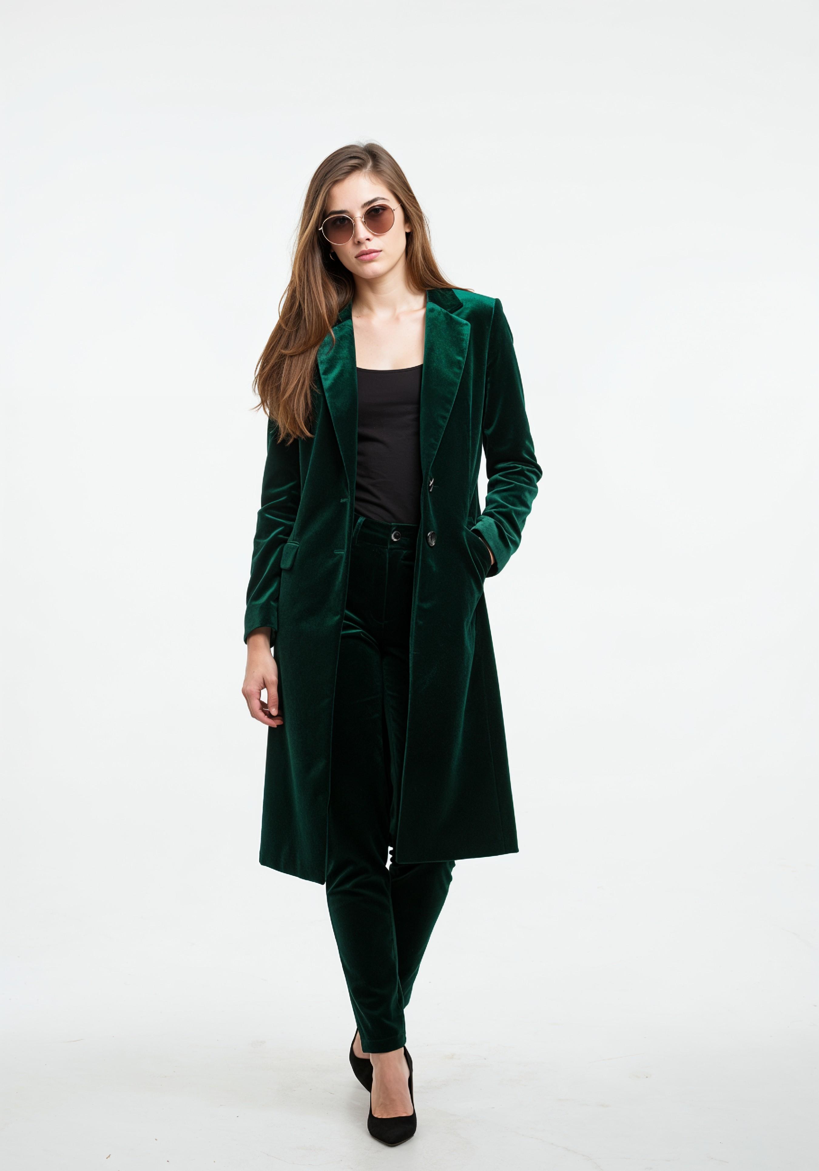 Elegant Young Woman in Coat and Matching Trousers Fashion Portrait