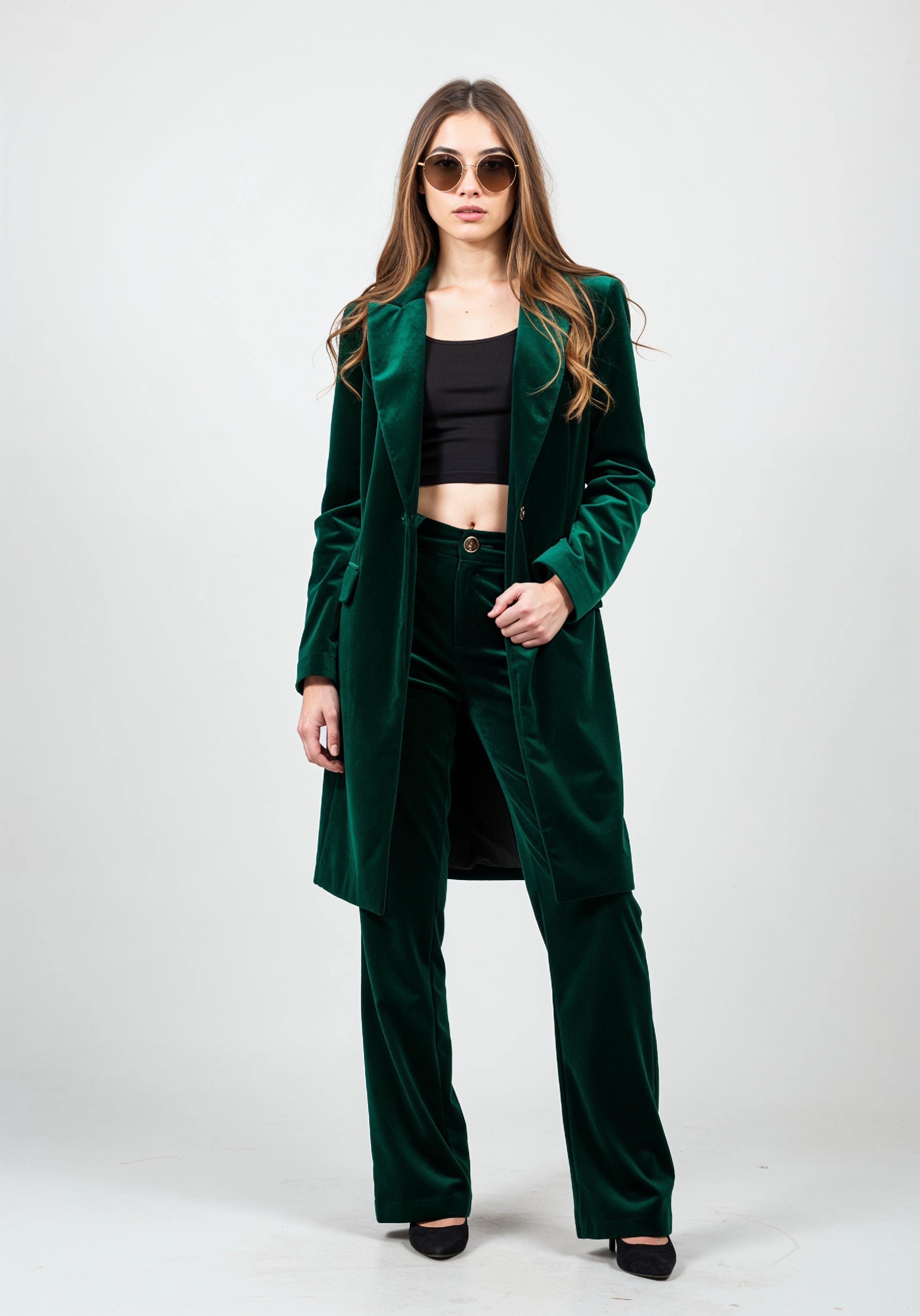 Elegant Young Woman in Coat and Matching Trousers Fashion Portrait
