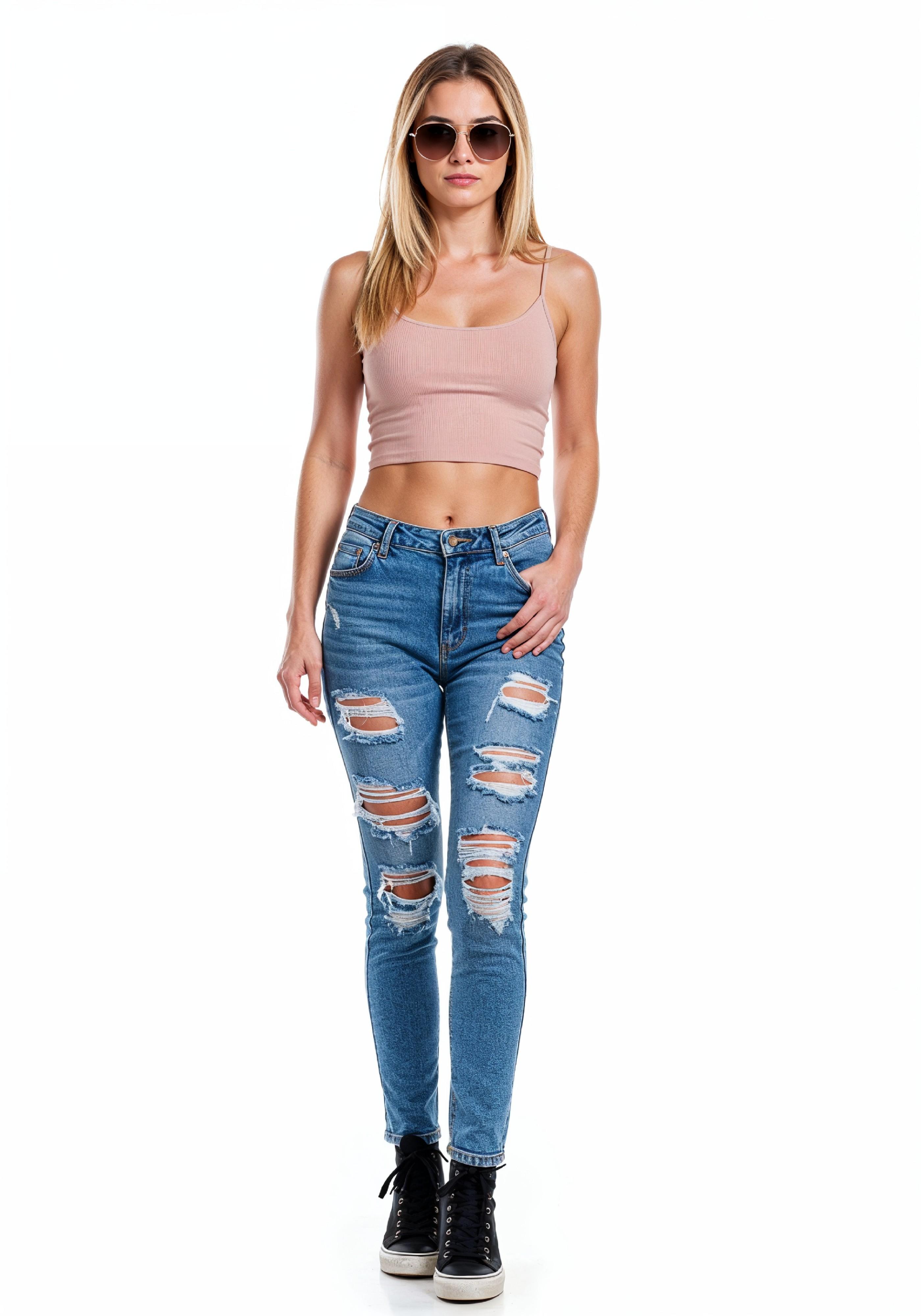 Fashionable Young Woman in Ripped Skinny Jeans and Crop Top Casual Street Style Portrait