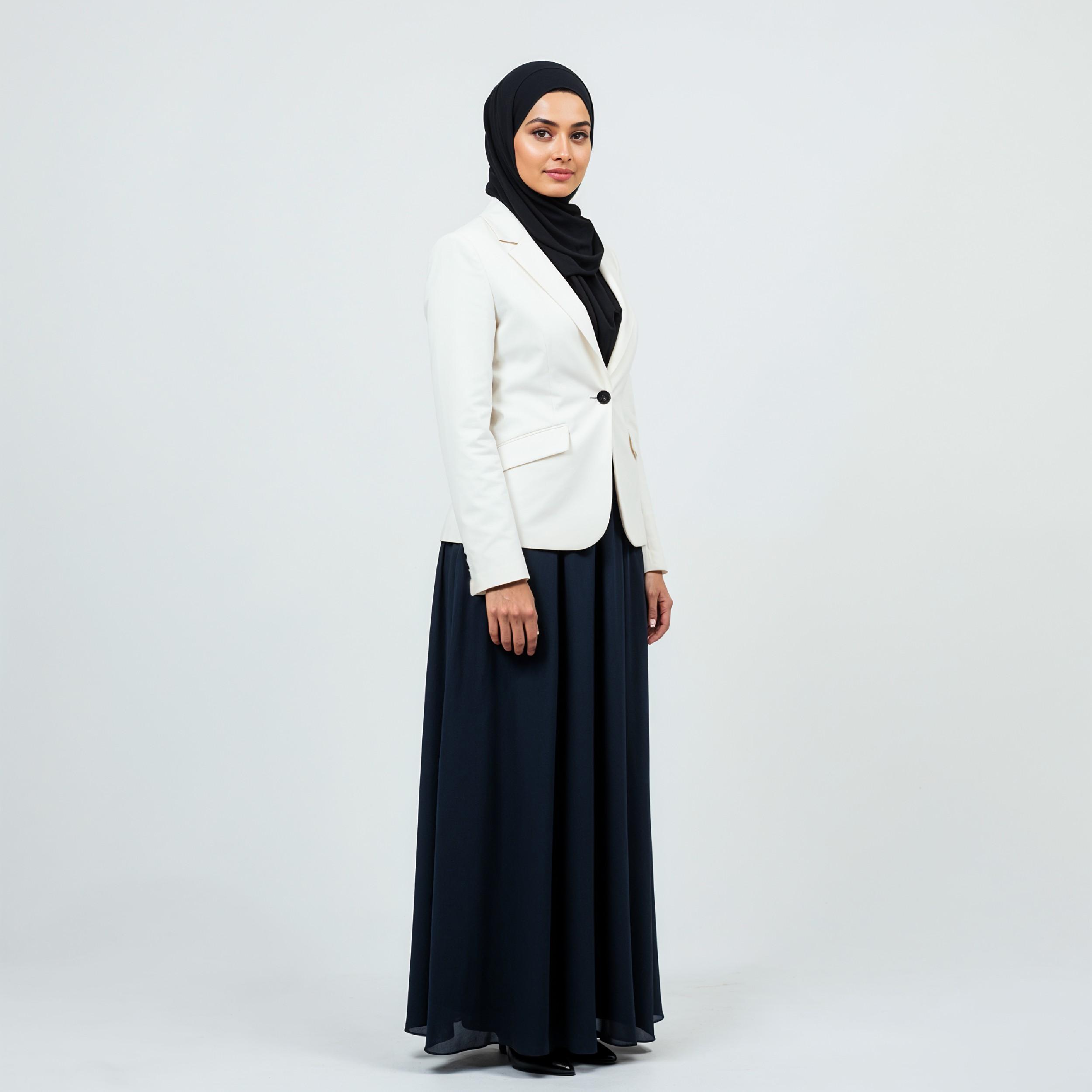 Professional Muslim Business Woman Wearing Hijab and Formal Suit in Studio Portrait