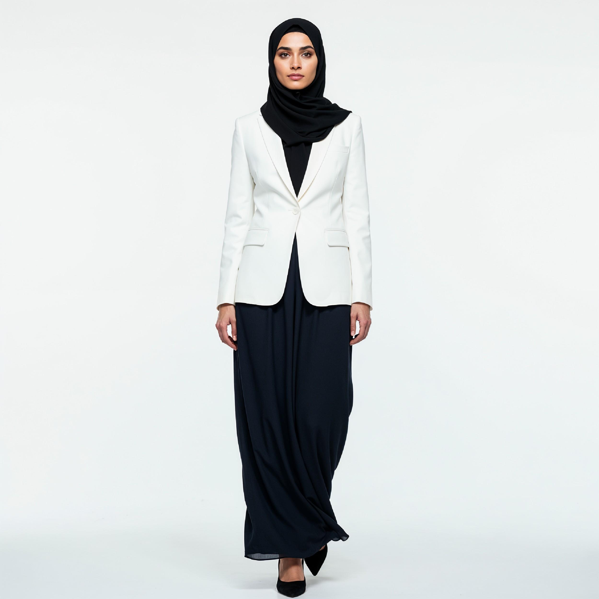 Professional Muslim Business Woman Wearing Hijab and Formal Suit in Studio Portrait
