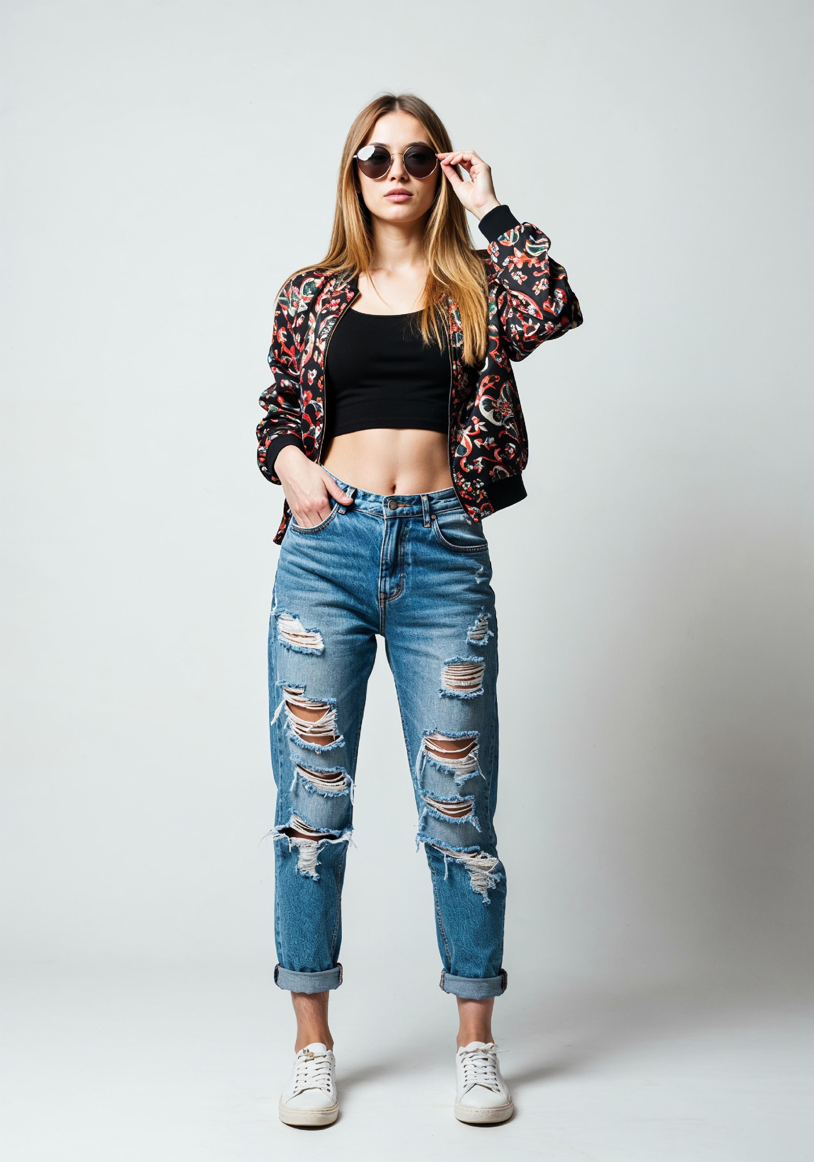 Stylish Young Woman in Floral Jacket and Ripped Jeans Trendy Street Fashion Portrait