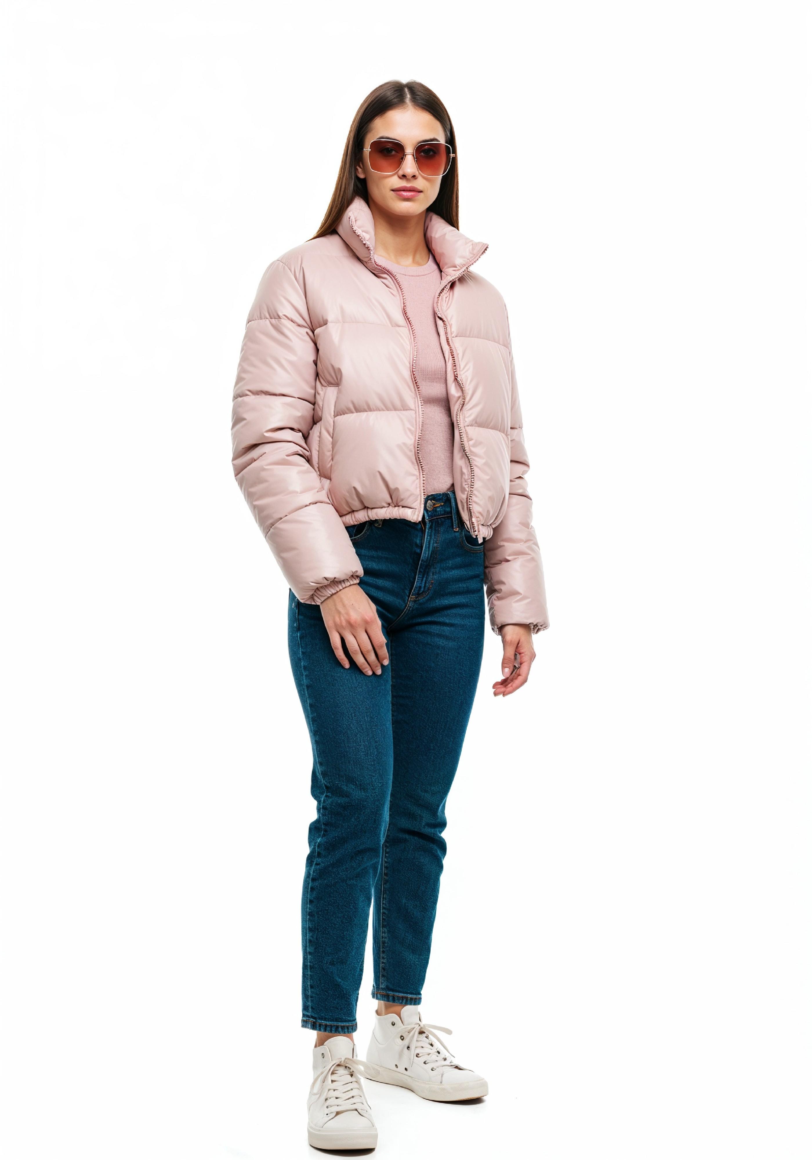 Stylish Young Woman in Pink Puffer Jacket and Blue Jeans Winter Fashion Portrait