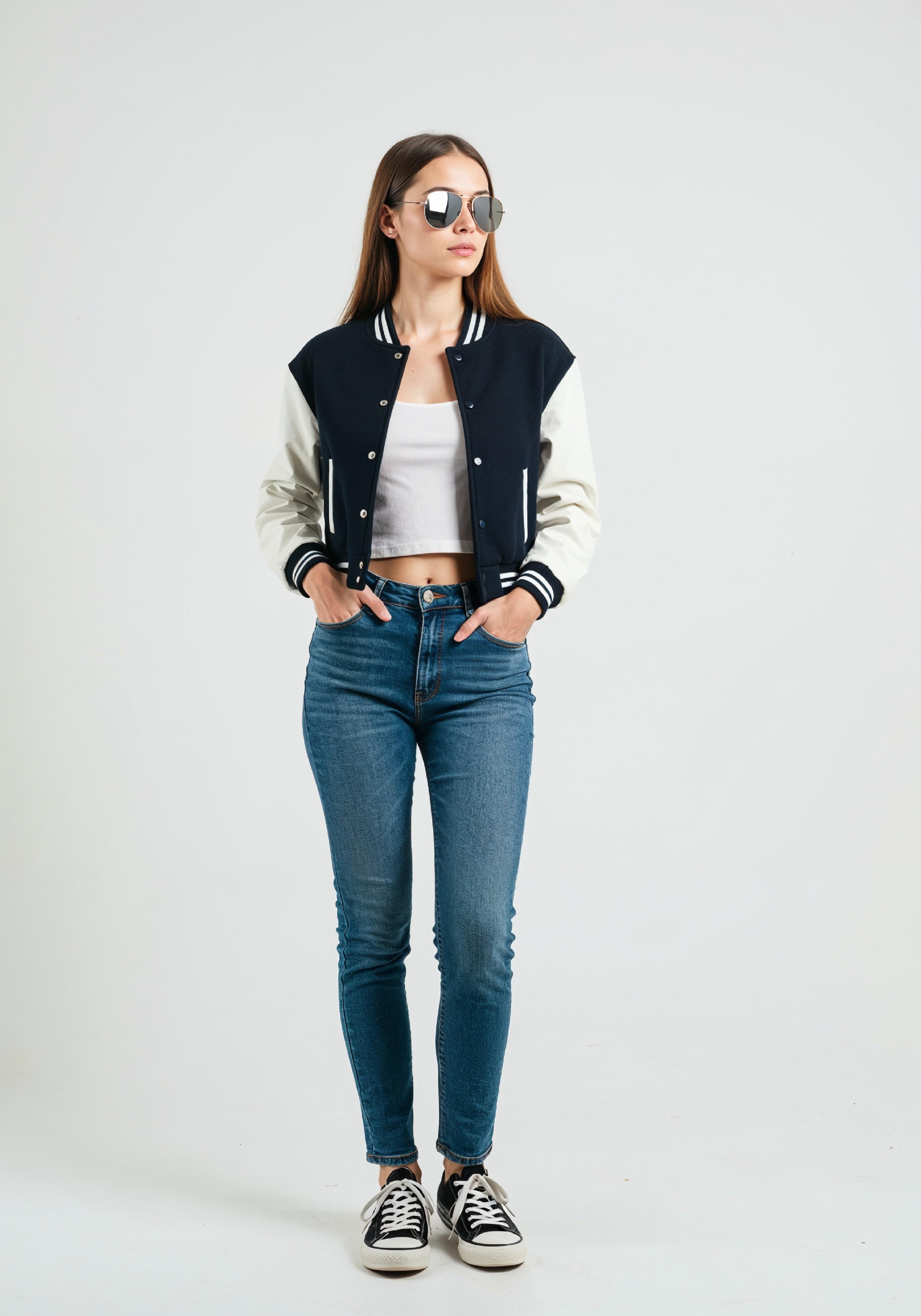 Stylish Young Woman in Varsity Jacket and Skinny Jeans Casual Fashion Portrait