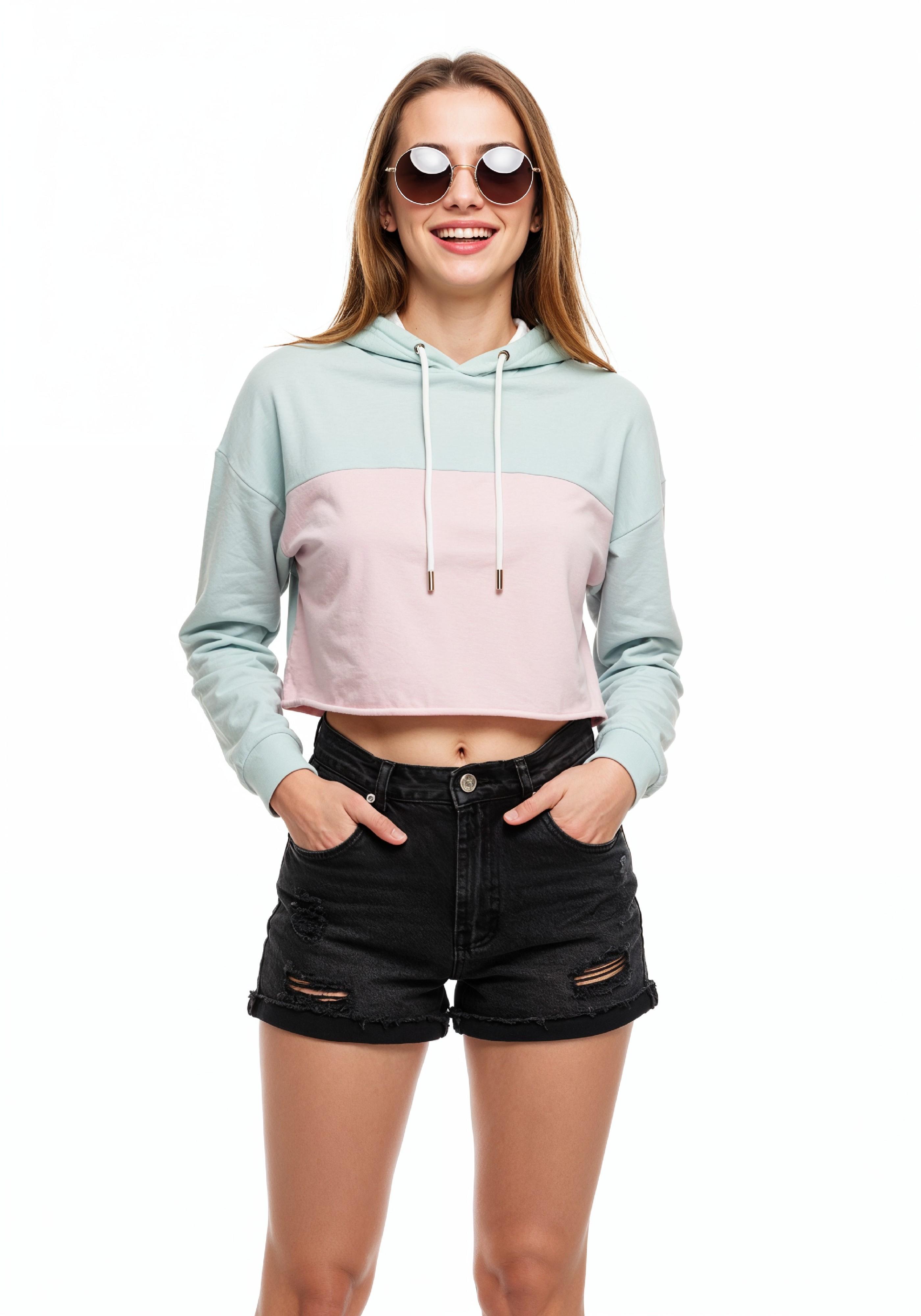 Trendy Young Woman in Black Denim Shorts and Pastel Hoodie Casual Fashion Portrait