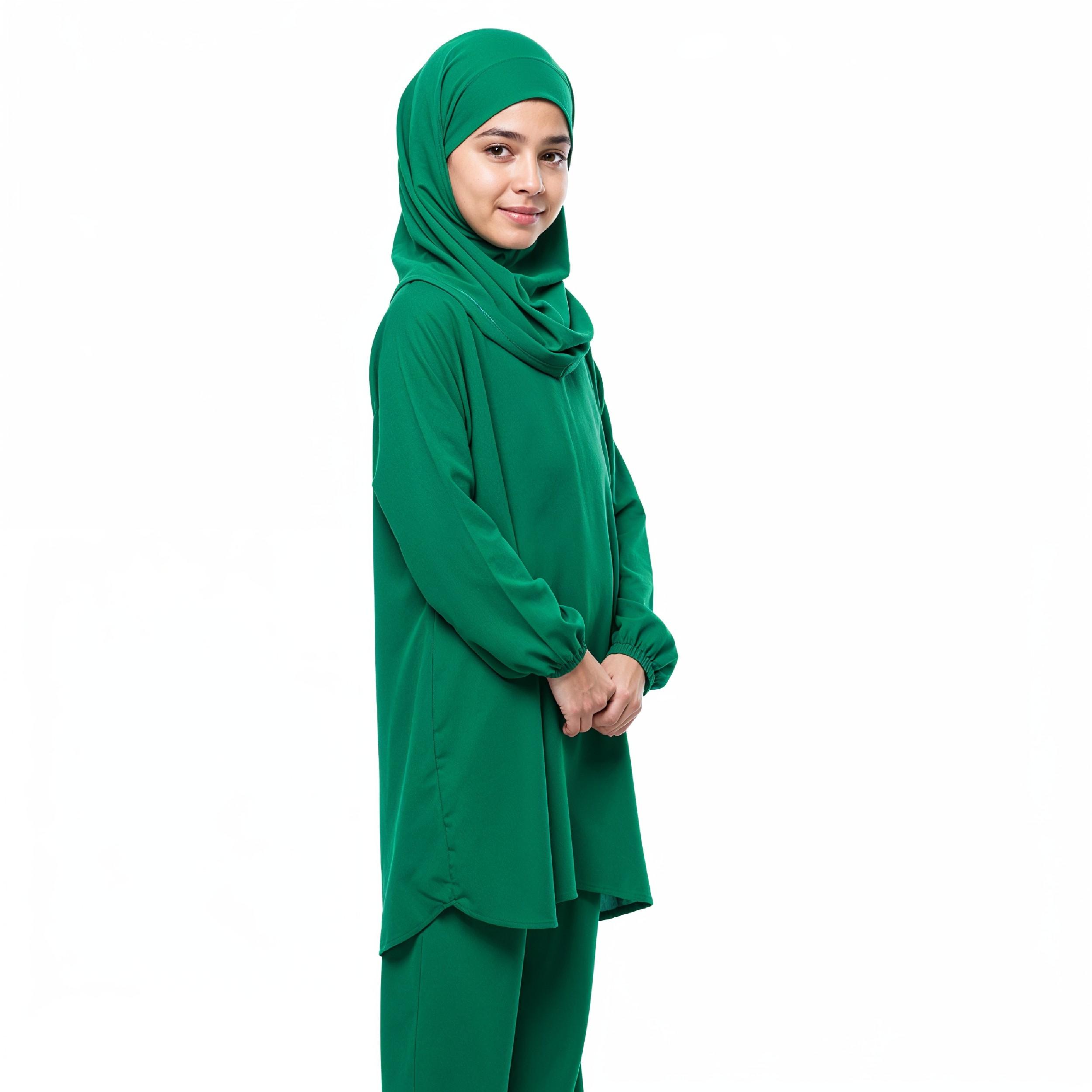 Young Islamic Girl Wearing Green Hijab and Modest Traditional Outfit Studio Portrait