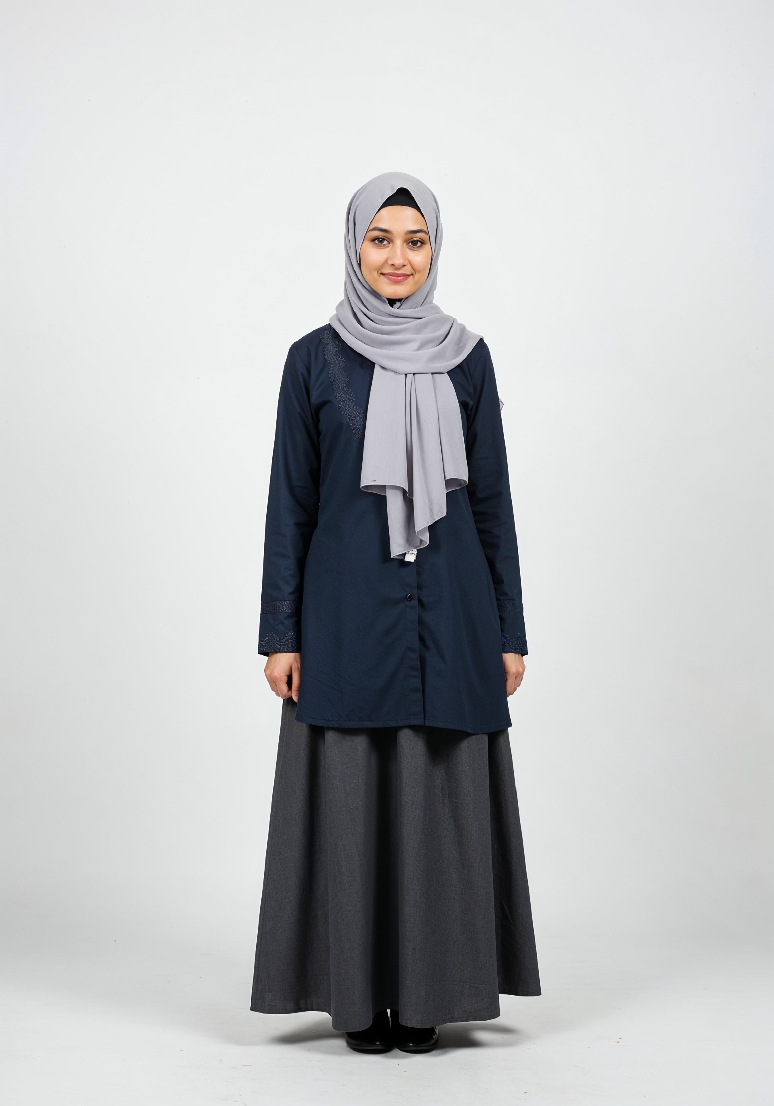 Young Muslim Woman in Modest Traditional Attire Educational Portrait