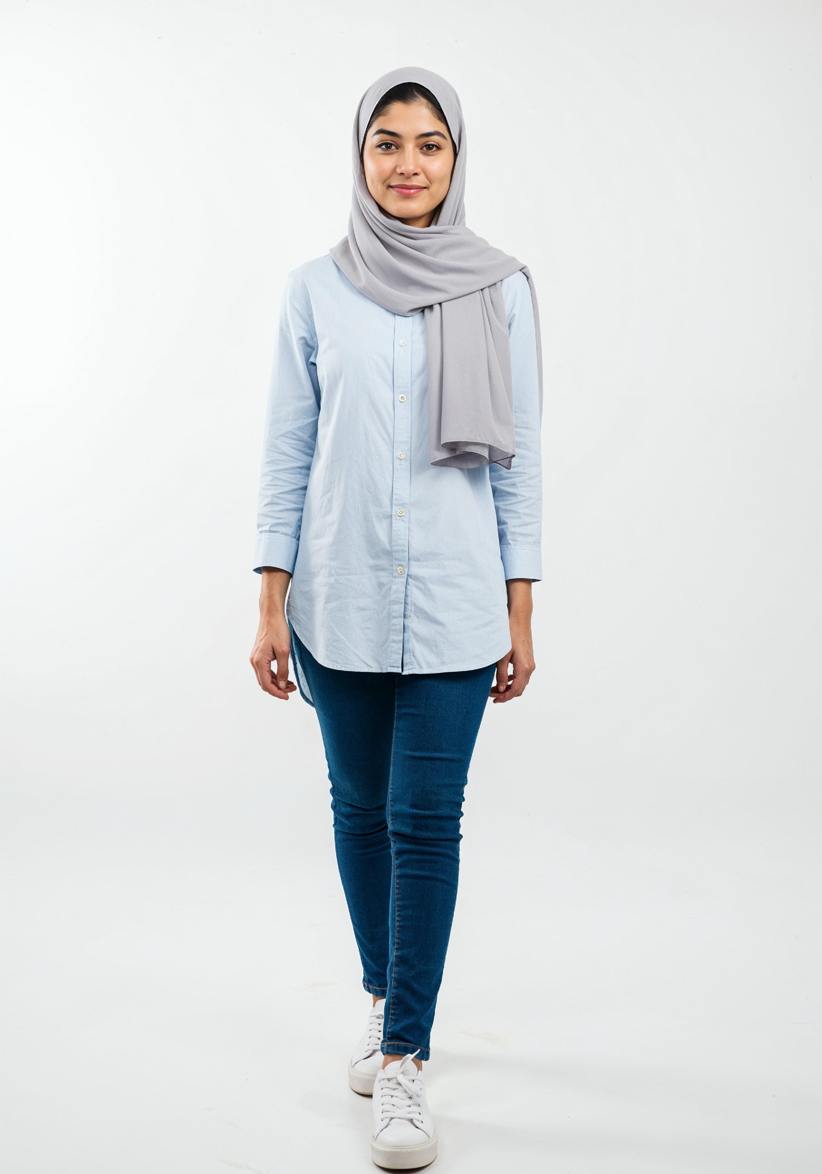 Young Muslim Woman in Modest Traditional Attire Educational Portrait