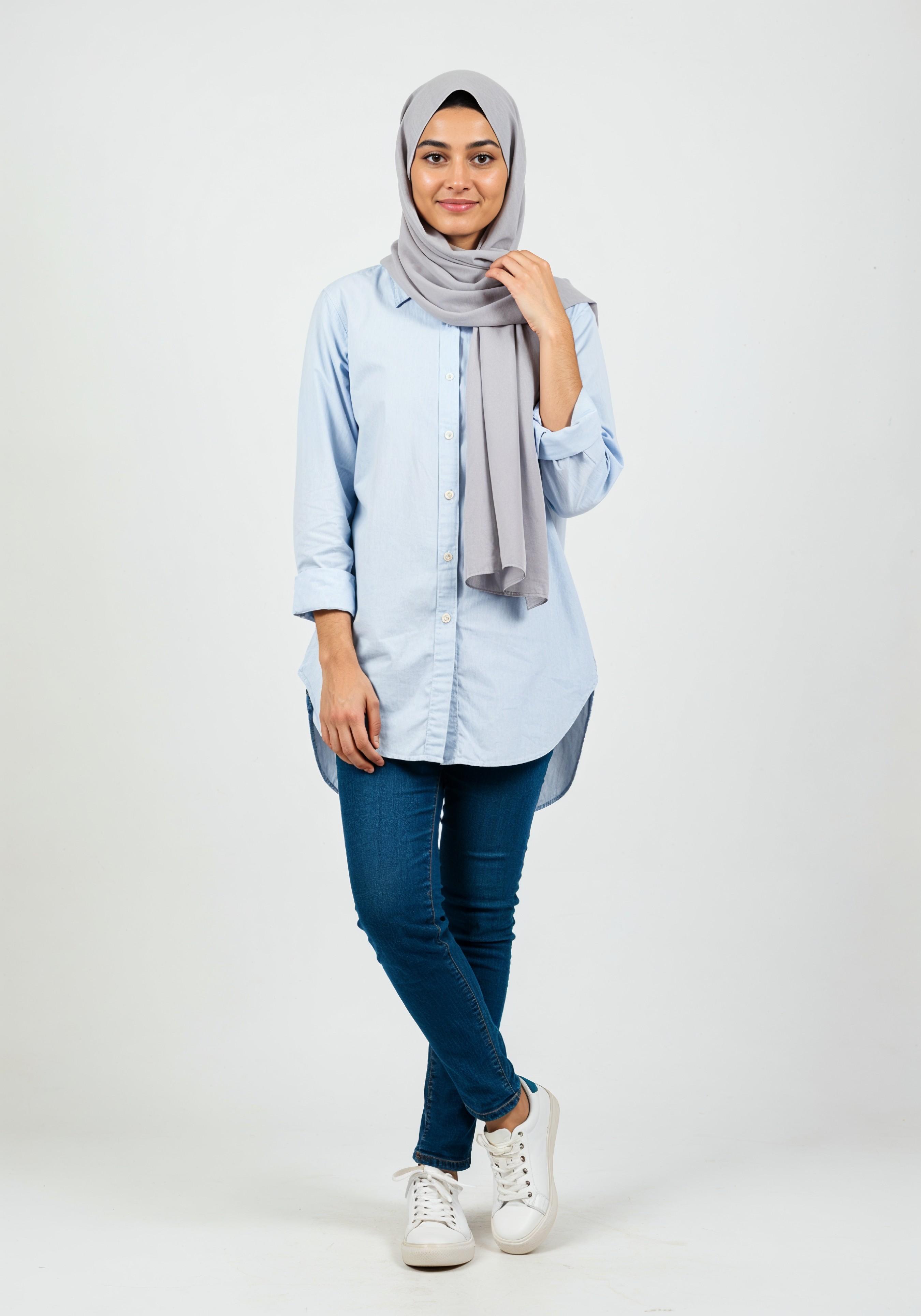 Young Muslim Woman in Modest Traditional Attire Educational Portrait