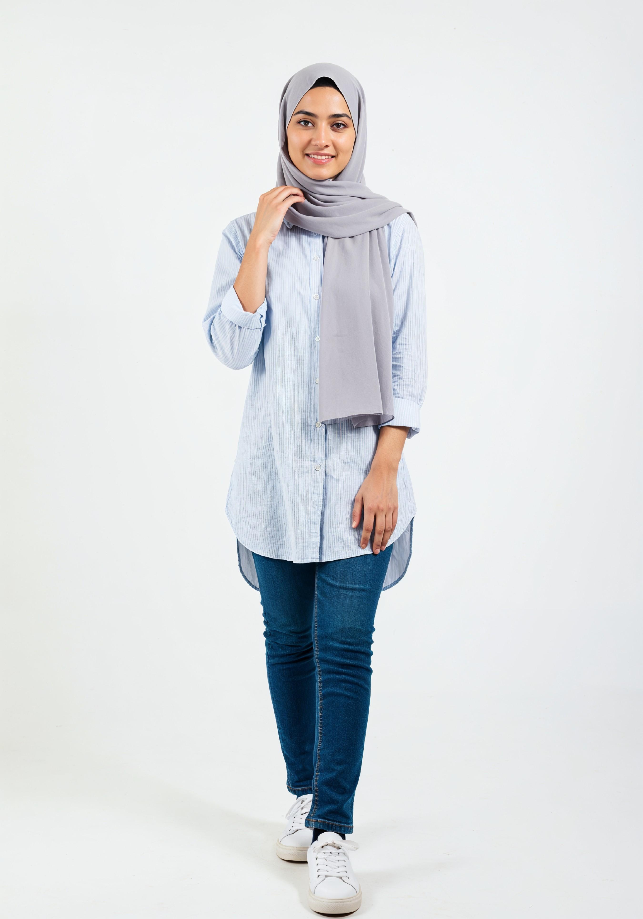 Young Muslim Woman in Modest Traditional Attire Educational Portrait