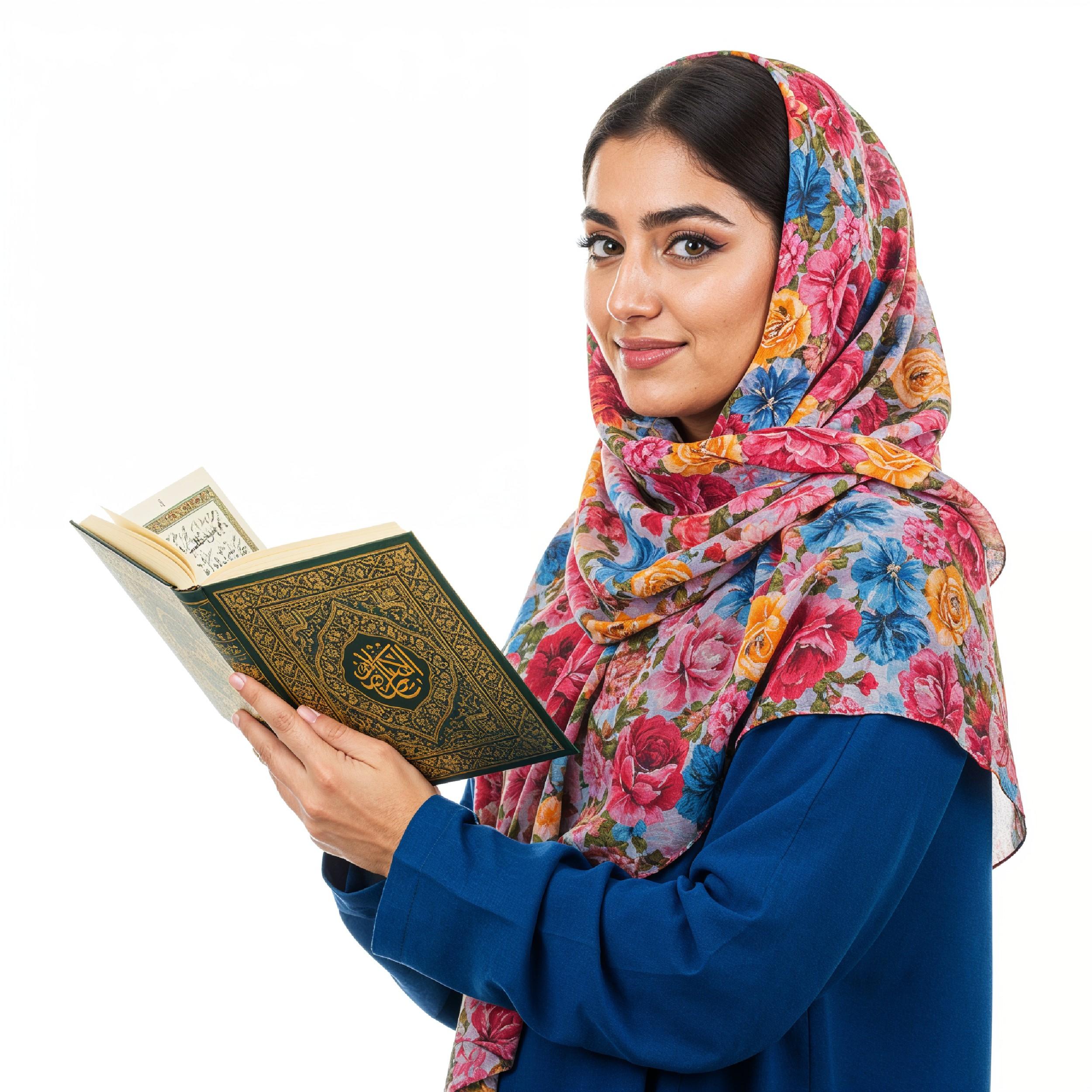 Young Muslim Woman Reading Holy Quran Wearing Colorful Floral Hijab in Studio Portrait