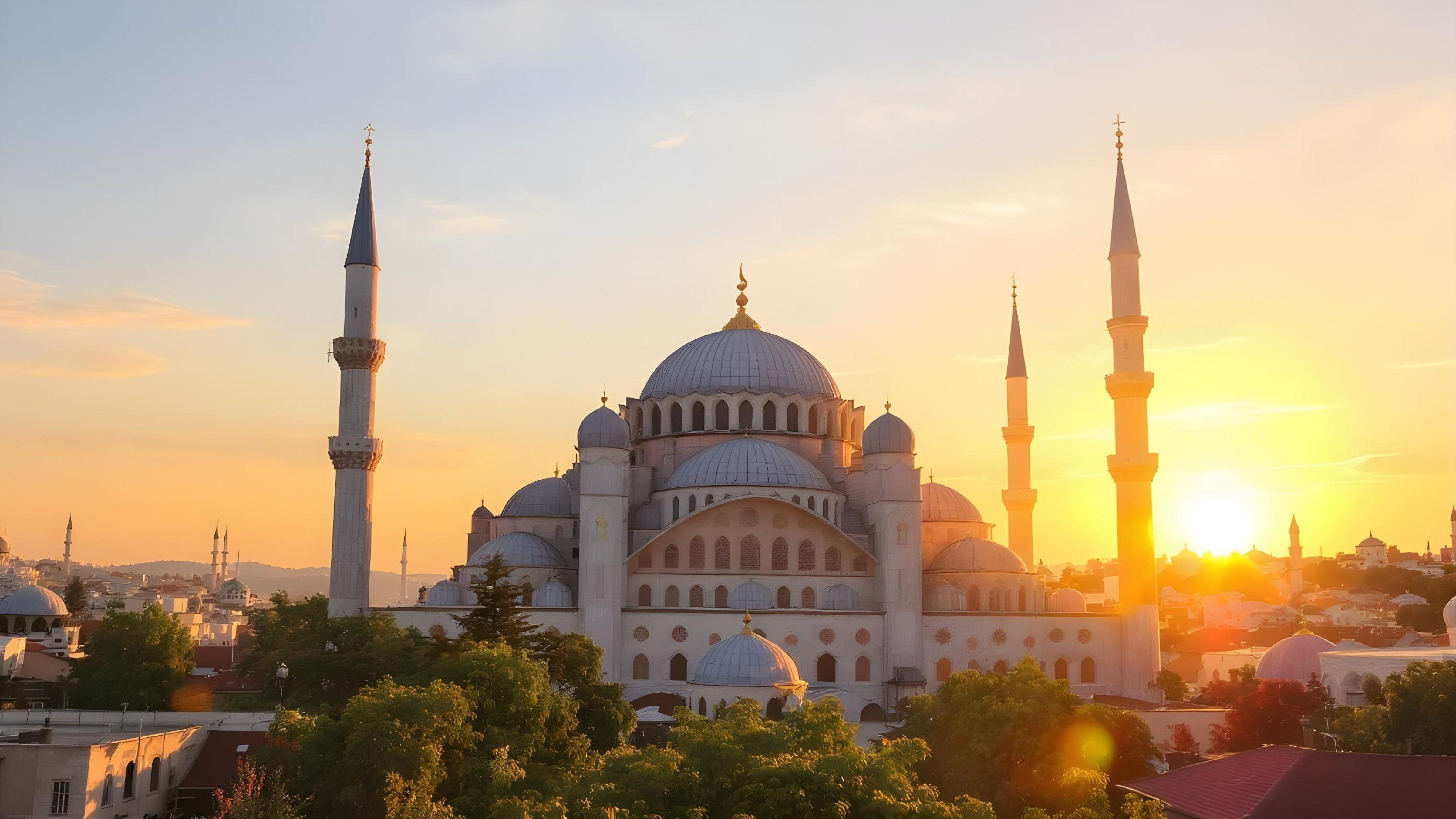 Beautiful Islamic Mosque at Sunset with Majestic Minarets and Golden Sky