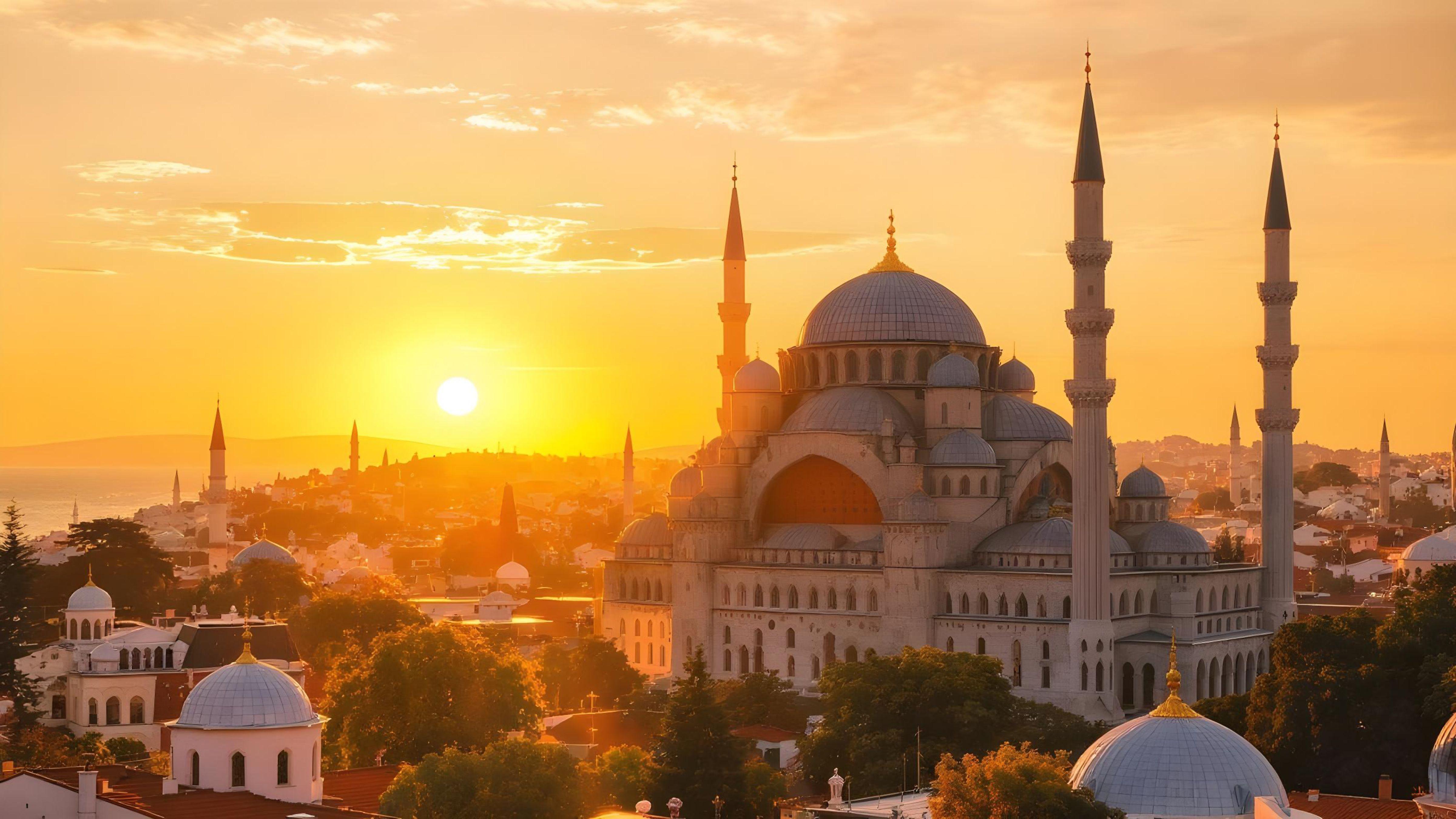 Beautiful Islamic Mosque at Sunset with Majestic Minarets and Golden Sky