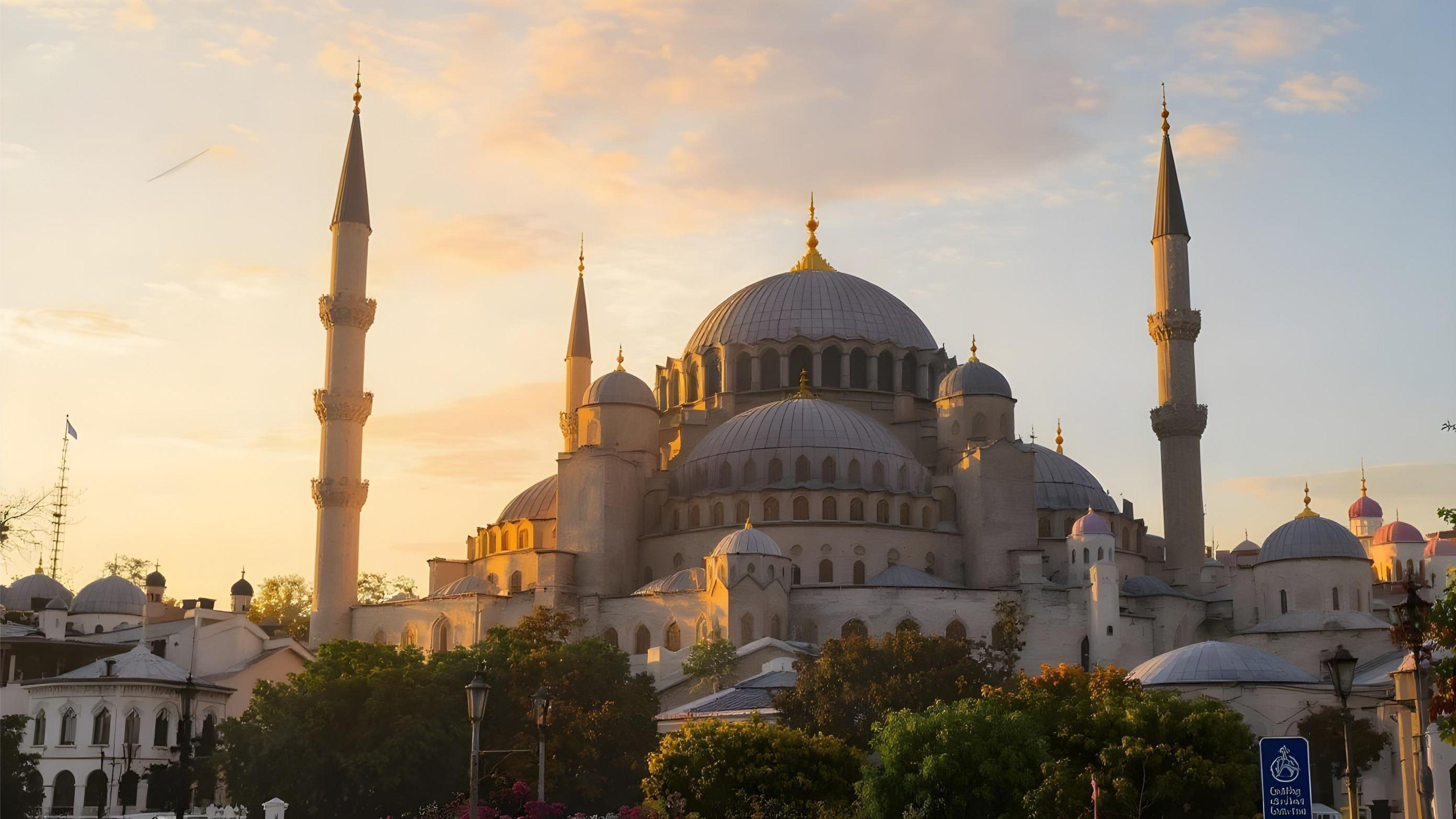 Beautiful Islamic Mosque at Sunset with Majestic Minarets and Golden Sky