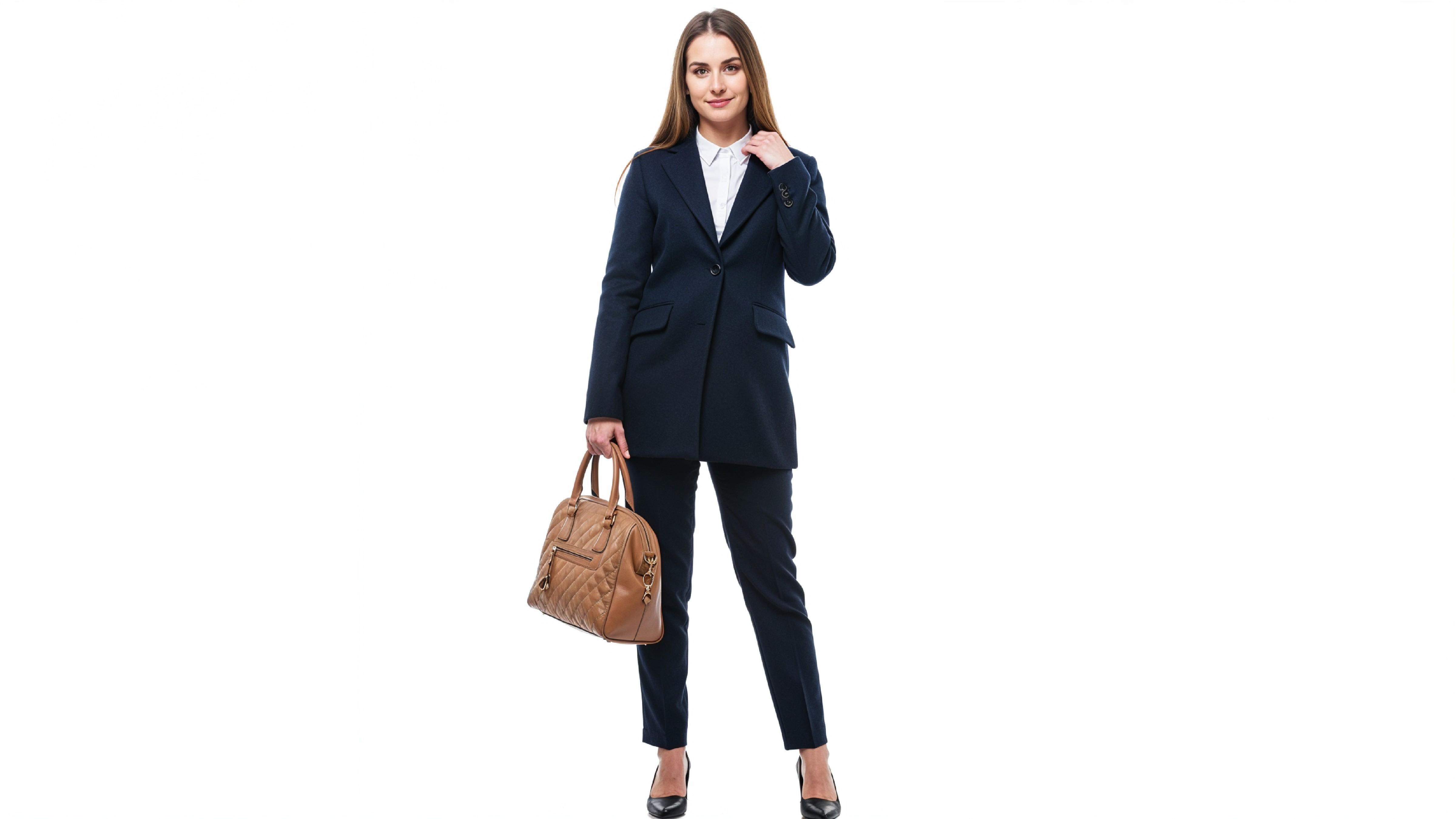Confident Business Woman in Navy Blue Formal Outfit with Handbag