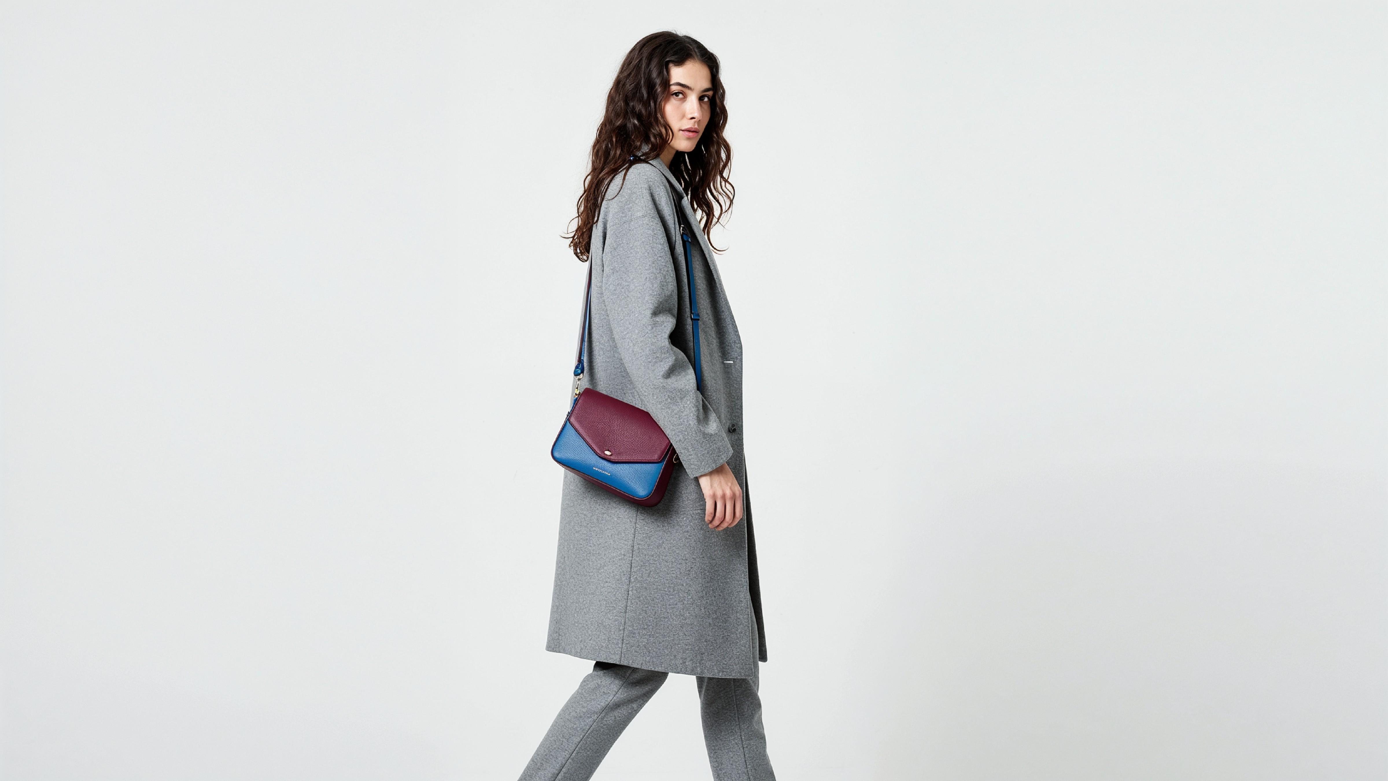 Fashionable Woman in Gray Coat and Trousers with Crossbody Bag
