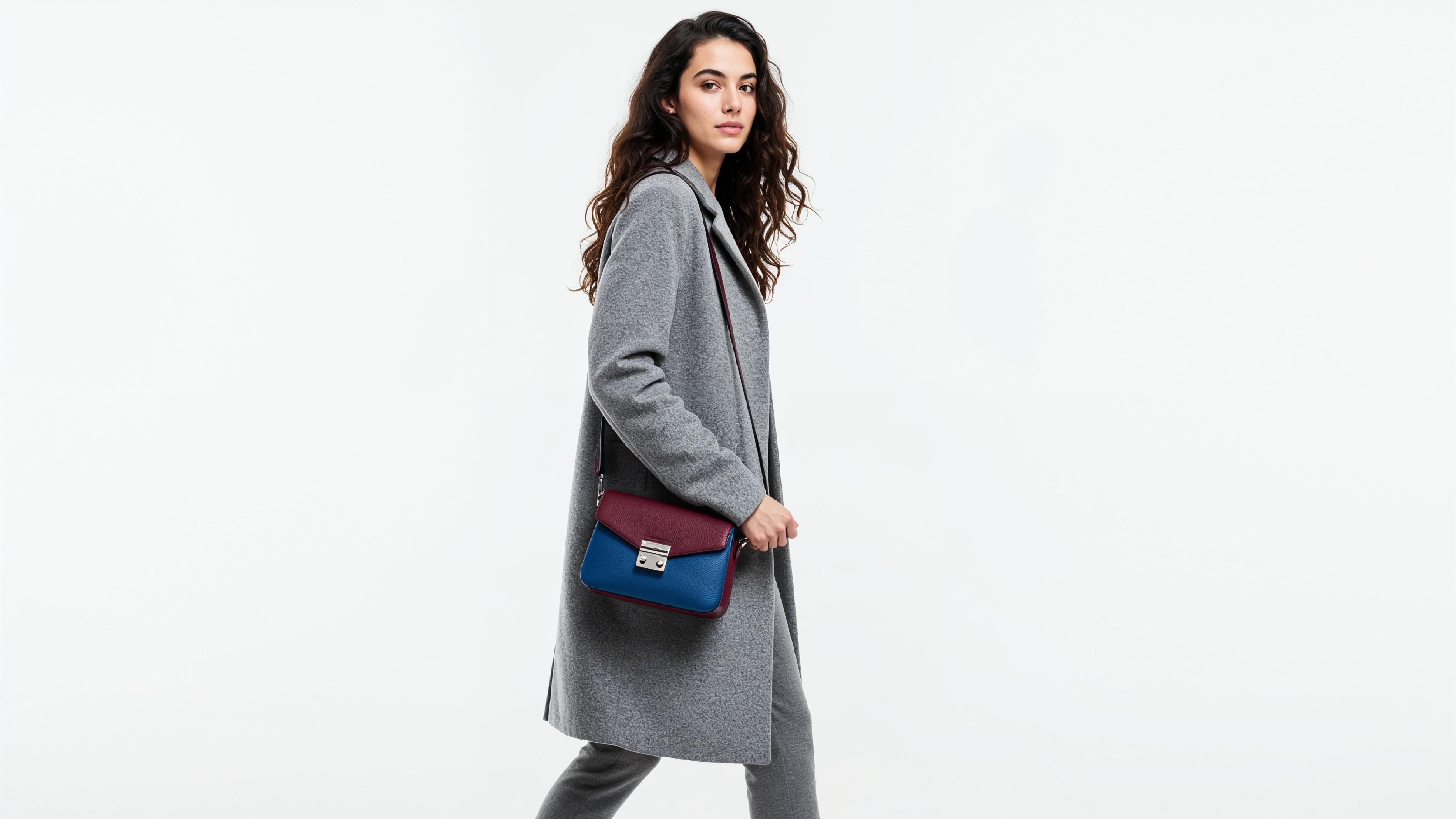 Fashionable Woman in Gray Coat and Trousers with Crossbody Bag