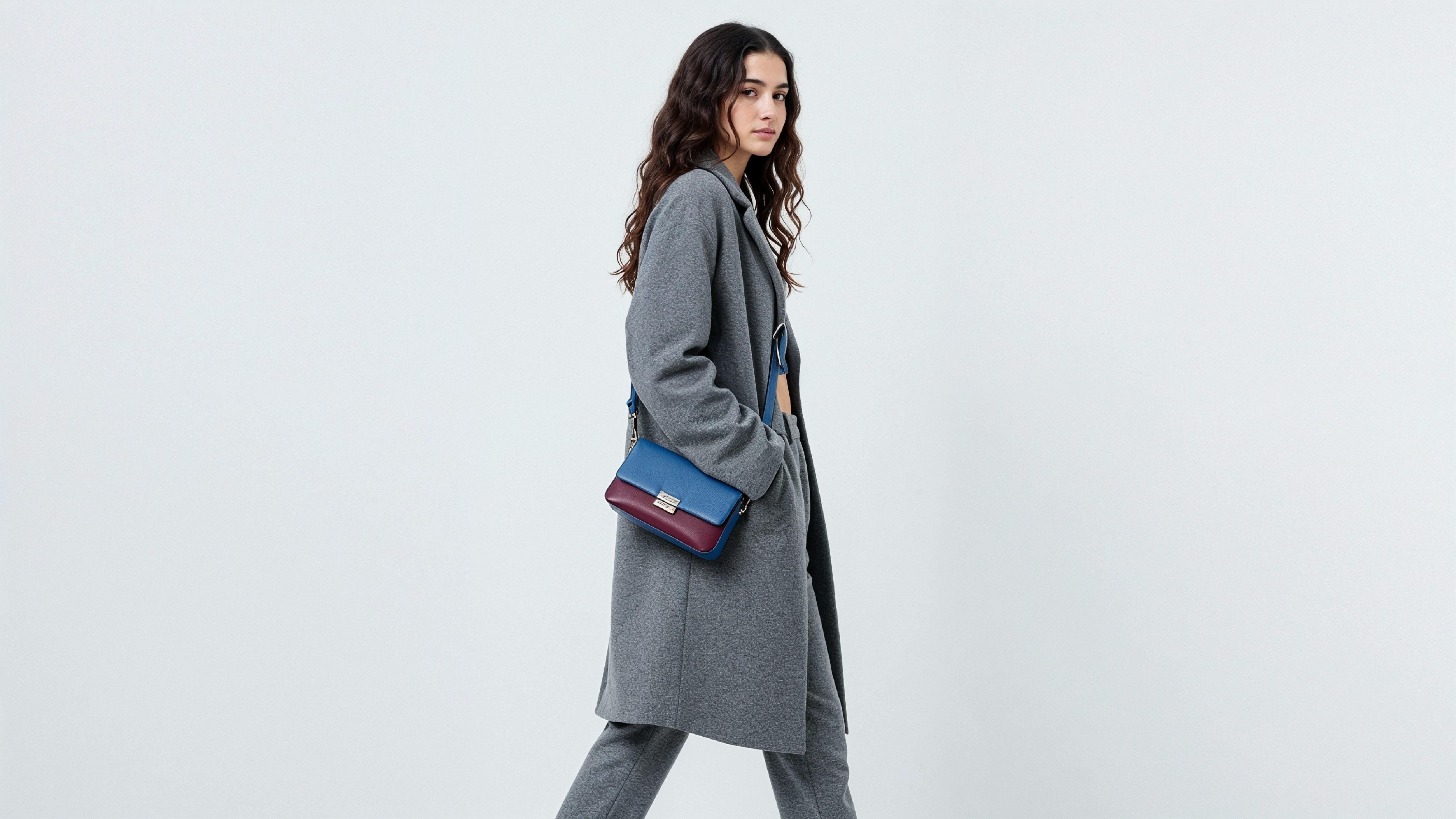 Fashionable Woman in Gray Coat and Trousers with Crossbody Bag