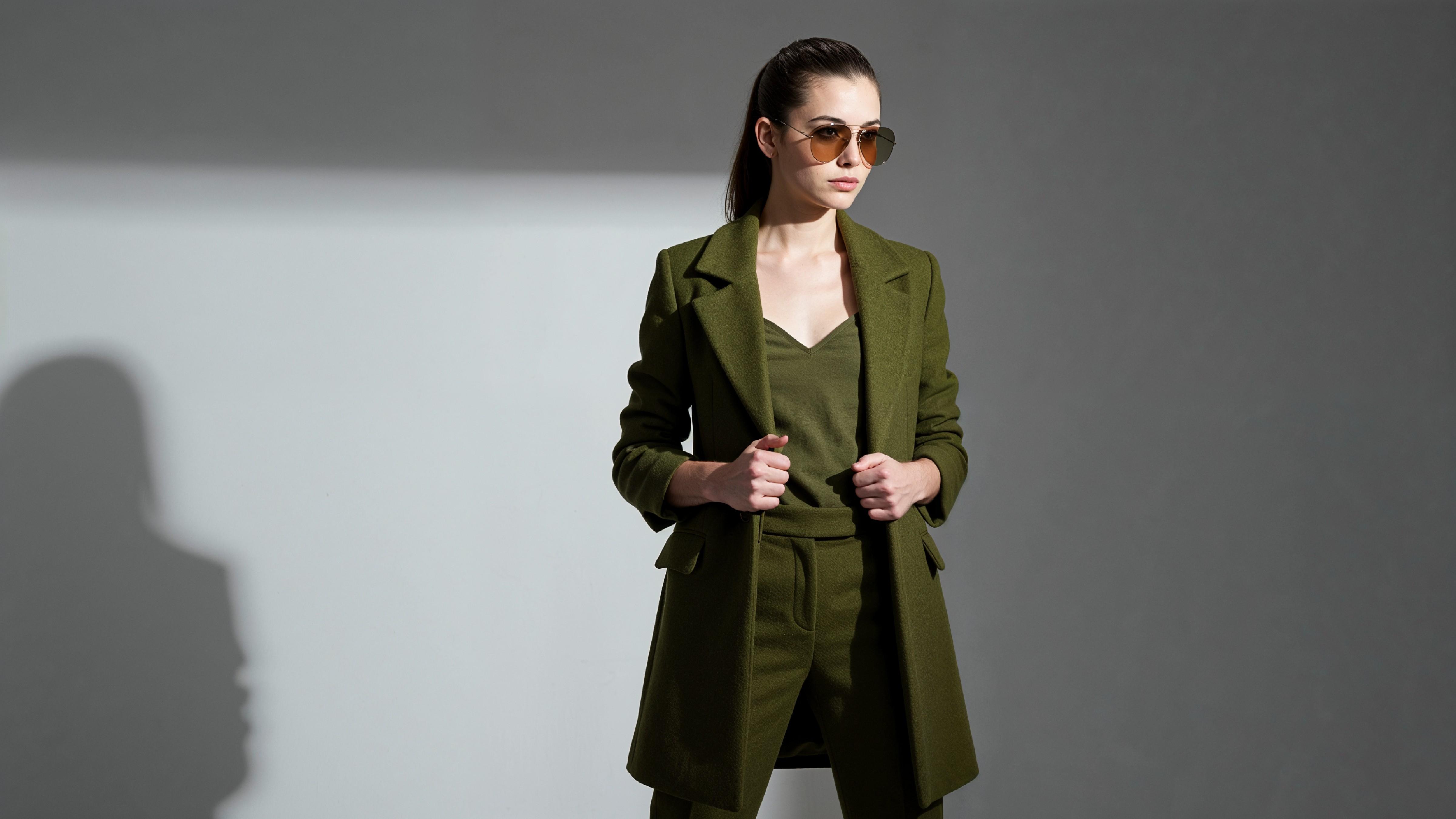 Stylish Young Woman Wearing Elegant Coat and Modern Fashion Outfit