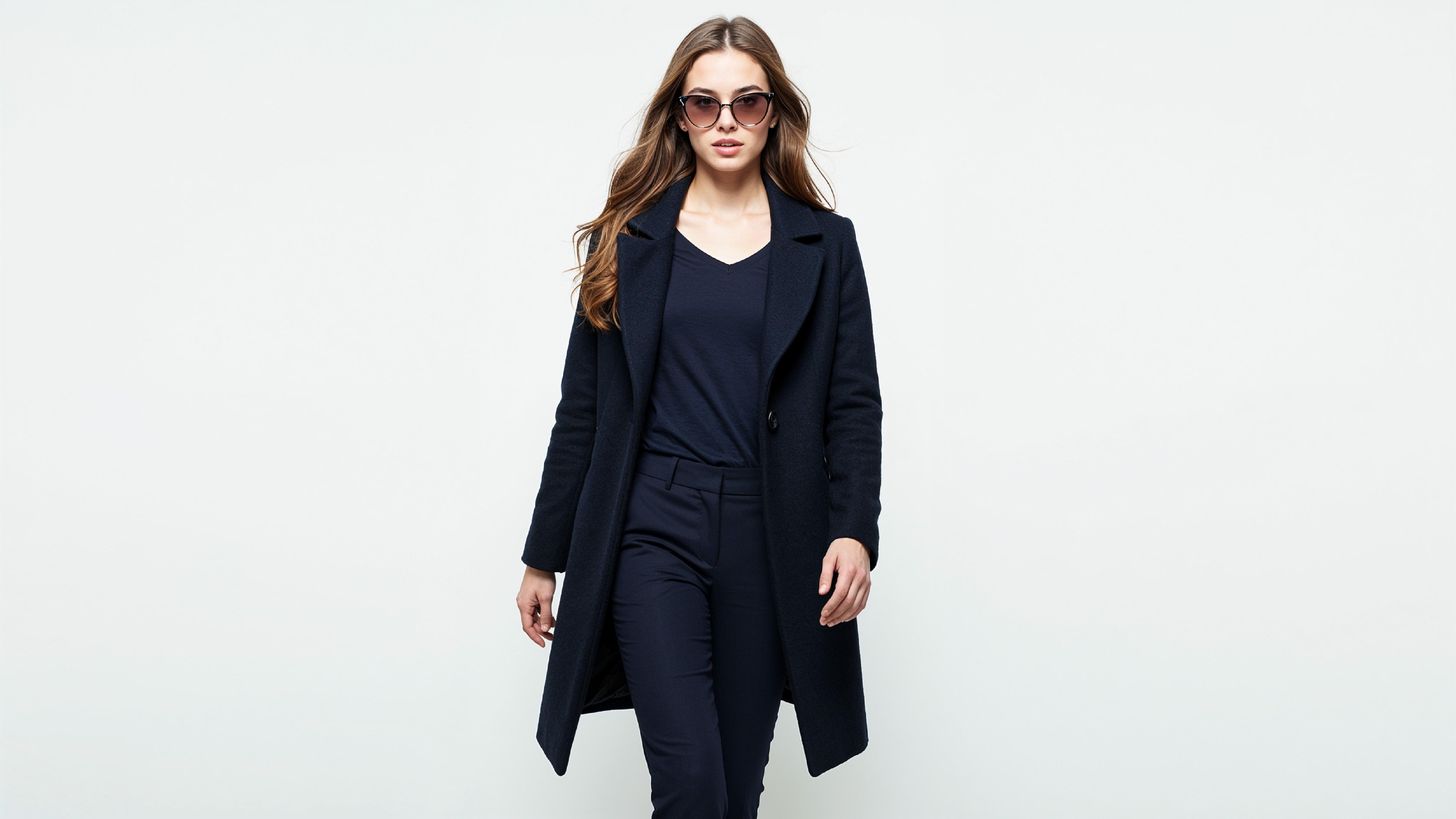 Stylish Young Woman Wearing Elegant Coat and Modern Fashion Outfit